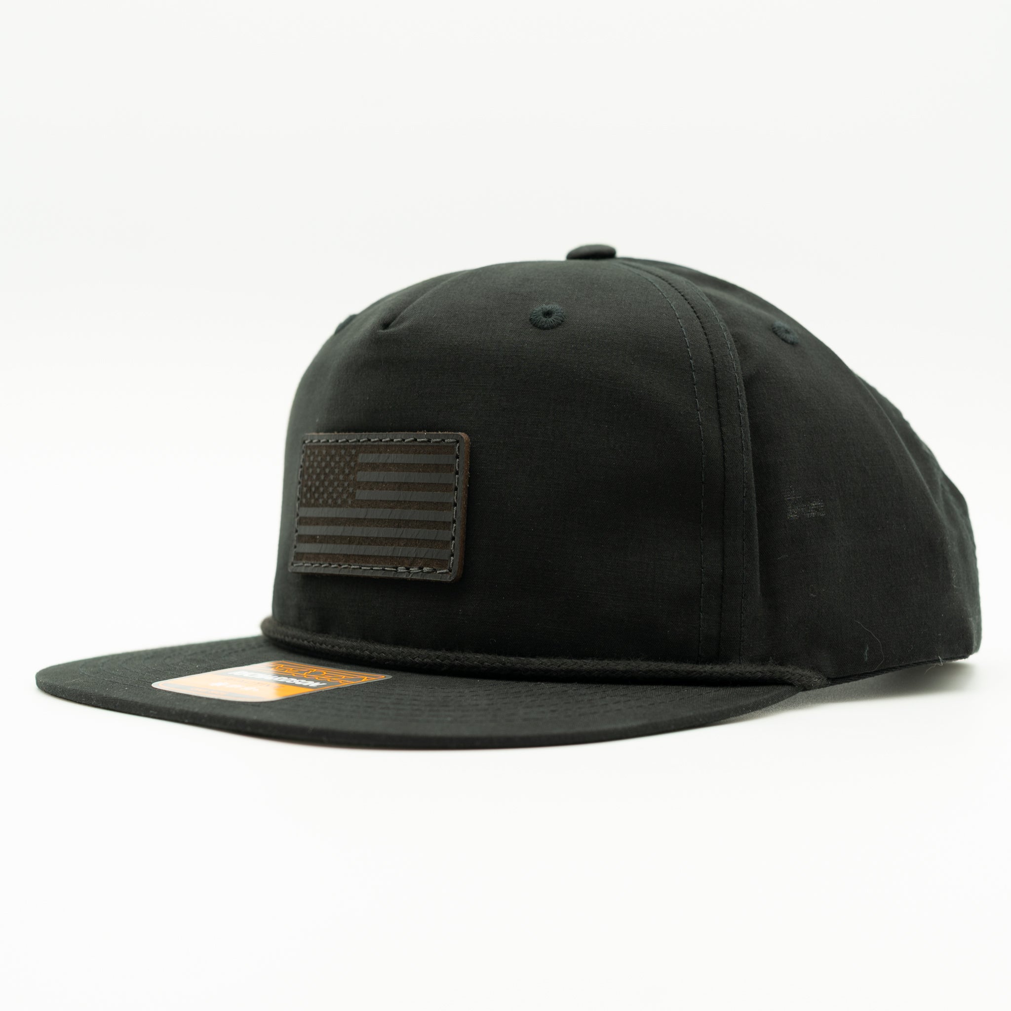 Black Richardson 256 rope hat with black leather American flag patch, low profile flat bill snapback.