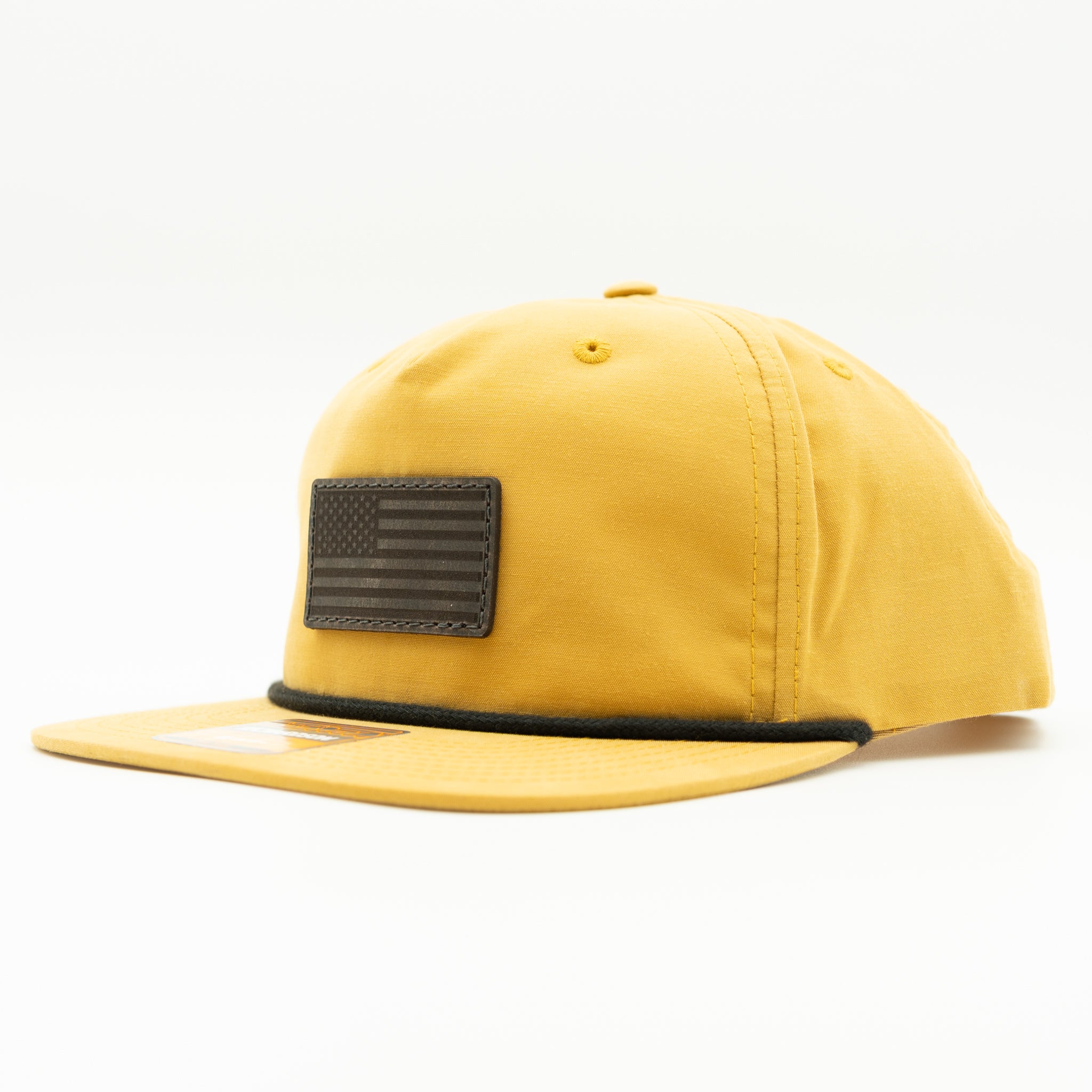 Biscuit Richardson 256 rope hat with charcoal leather American flag patch and flat bill.