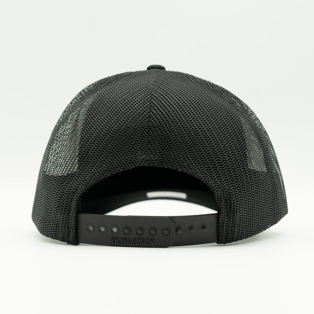 Back view of charcoal and black Richardson 112 Bearline Peak hat, showing black mesh back and adjustable plastic snapback closure.