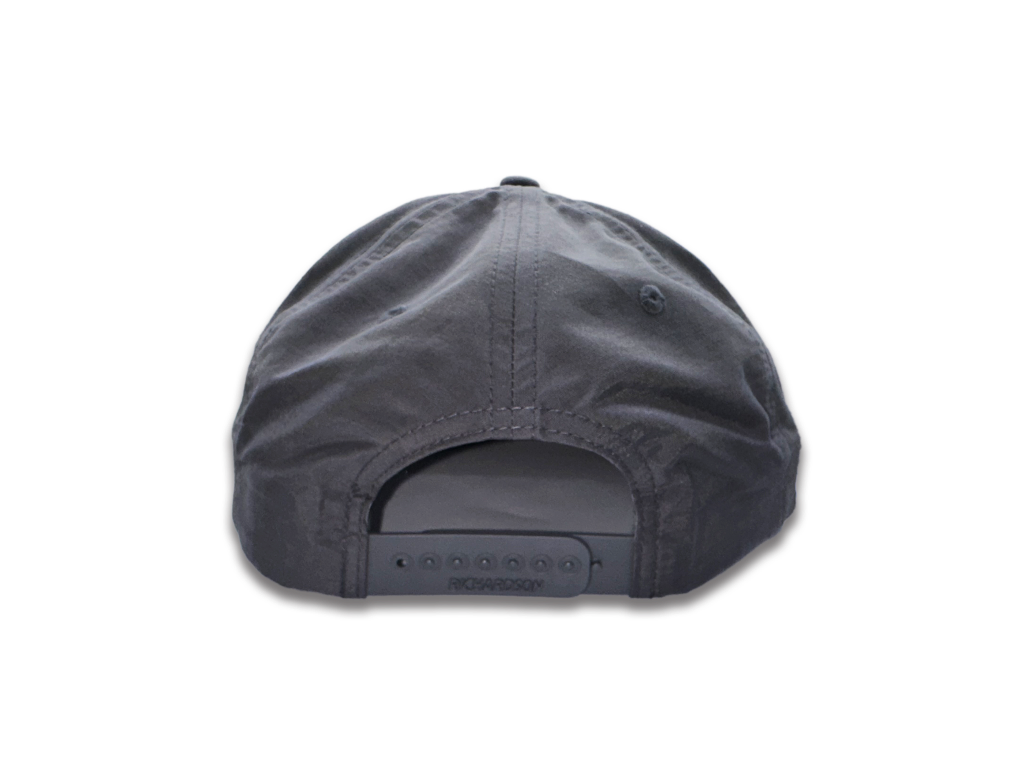 A SnapBack Richardson hat features an adjustable design that allows for a customizable fit. The hat is equipped with plastic snaps on the back, which can be easily adjusted to different sizes by snapping or unsnapping them. This adjustable feature ensures a secure and comfortable fit for various head sizes, making the SnapBack Richardson hat a versatile and practical choice for anyone looking for a personalized fit.