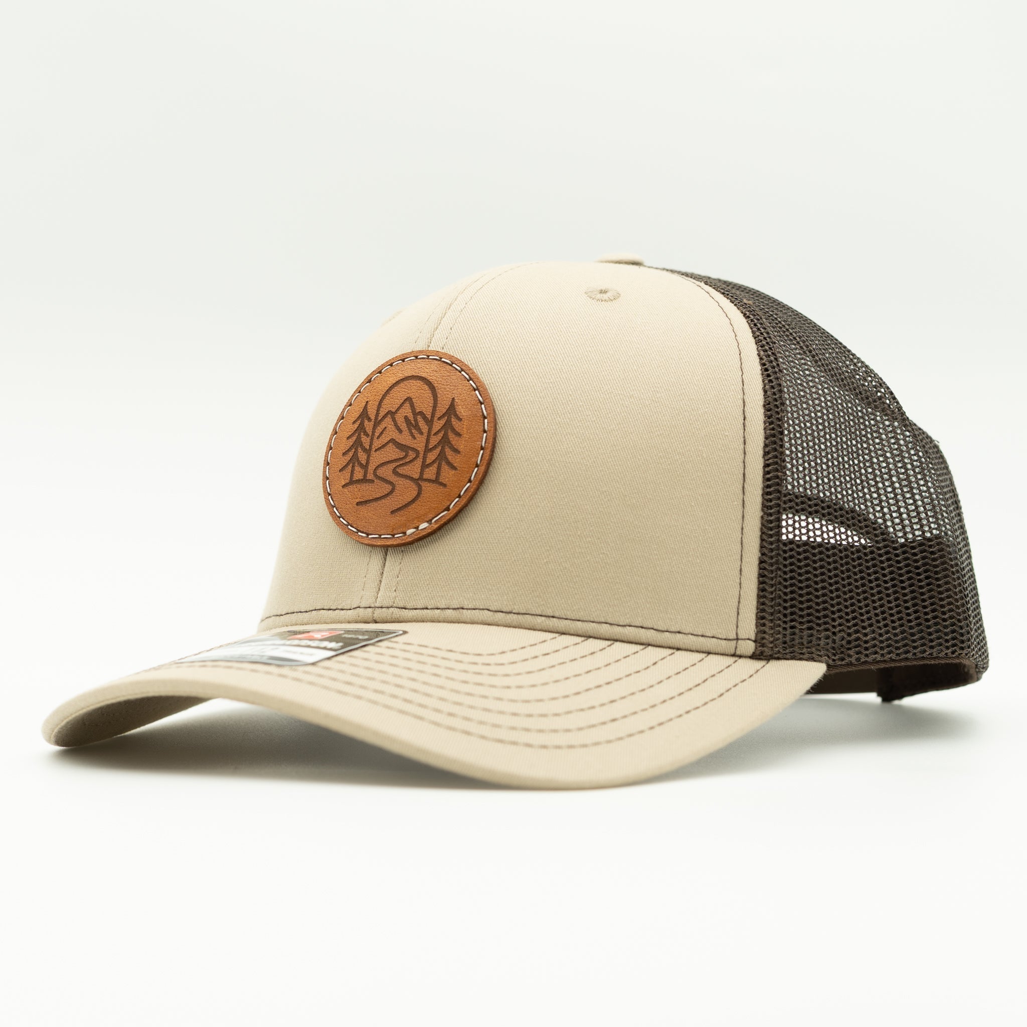 Side view of The Passage khaki and coffee Richardson 112 leather patch mountain hat.