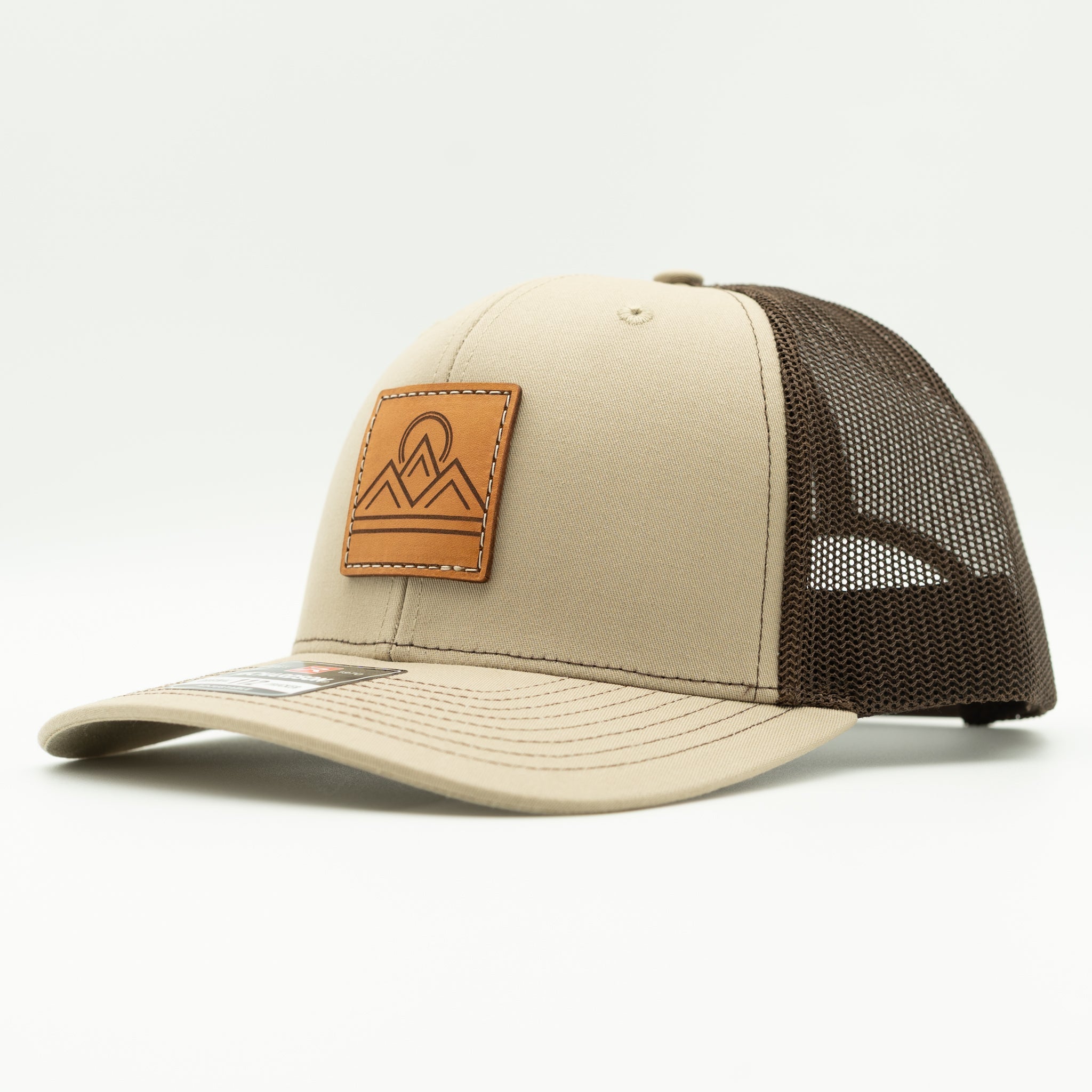 Side view of Lunar Ridge khaki and coffee Richardson 112 leather patch mountain hat with brown mesh back
Color: Khaki/Coffee