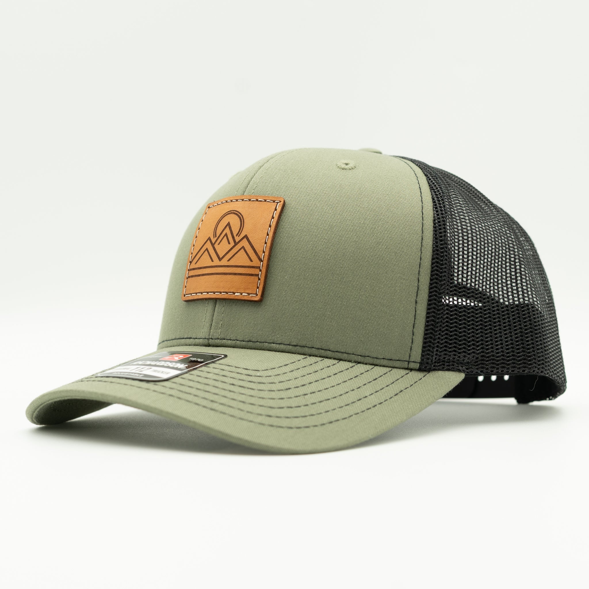 Side view of Lunar Ridge loden and black Richardson 112 leather patch mountain hat with black mesh back
Color: Loden/Black