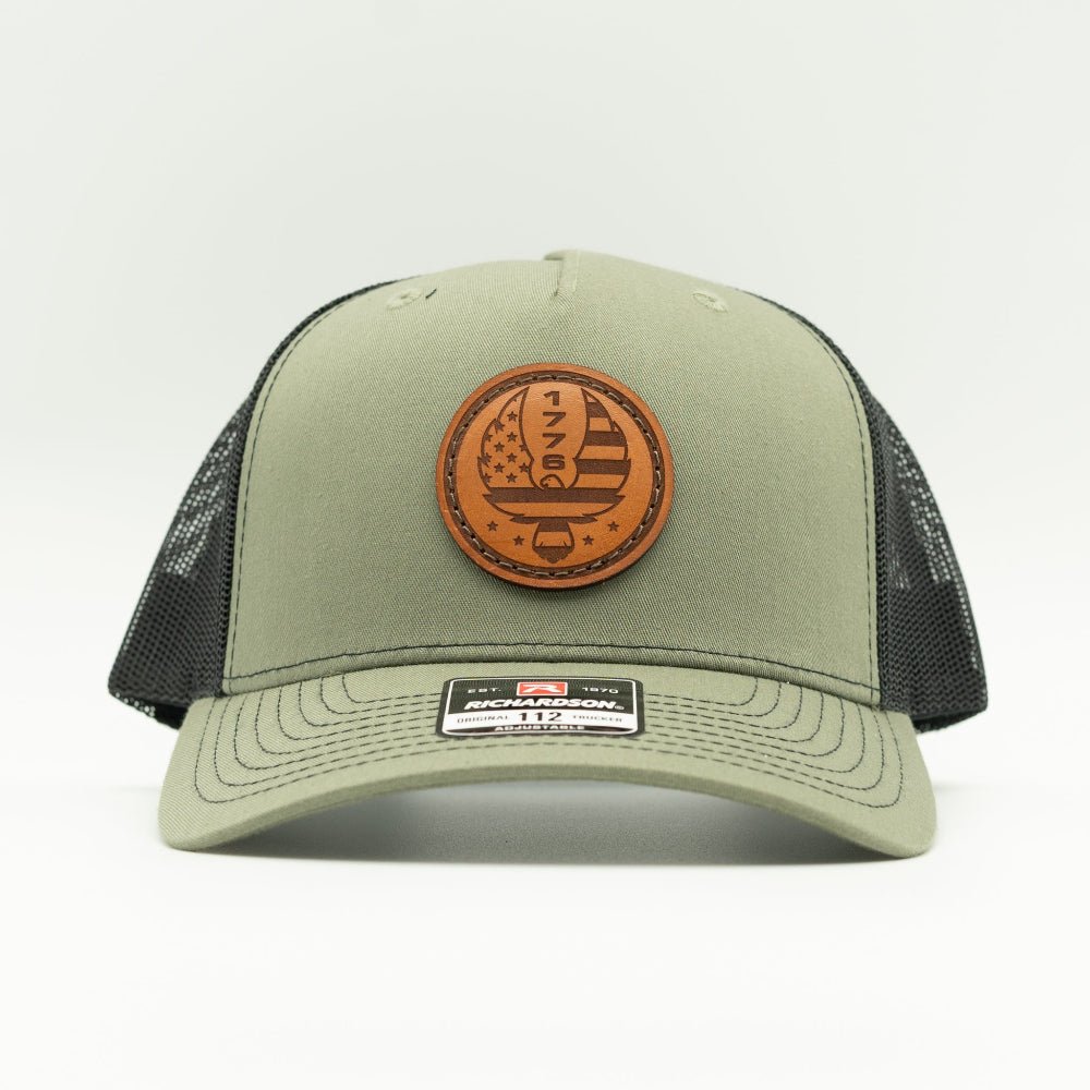 Custom Loden/black Richardson Leather Patch hat. Our custom designed leather patch is laser engraved and sewn onto a Richardson 112 Hat. We use full-grain, veg tanned leather. Our custom leather patches are handmade and designed in Colorado, USA.
Color: Loden/Black