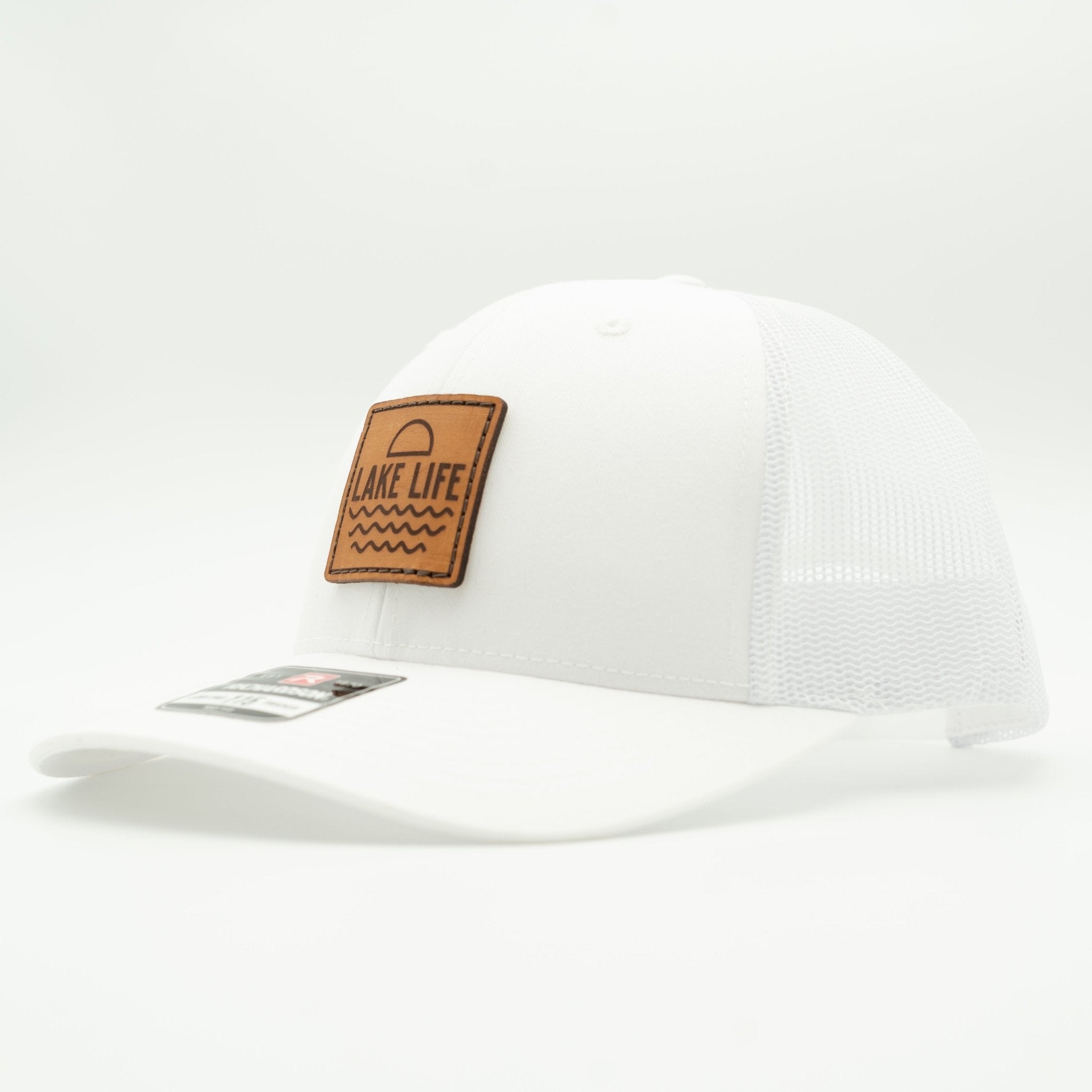 White cap with a brown patch labeled 'Lake Life' on a light gray background
Color: Solid White