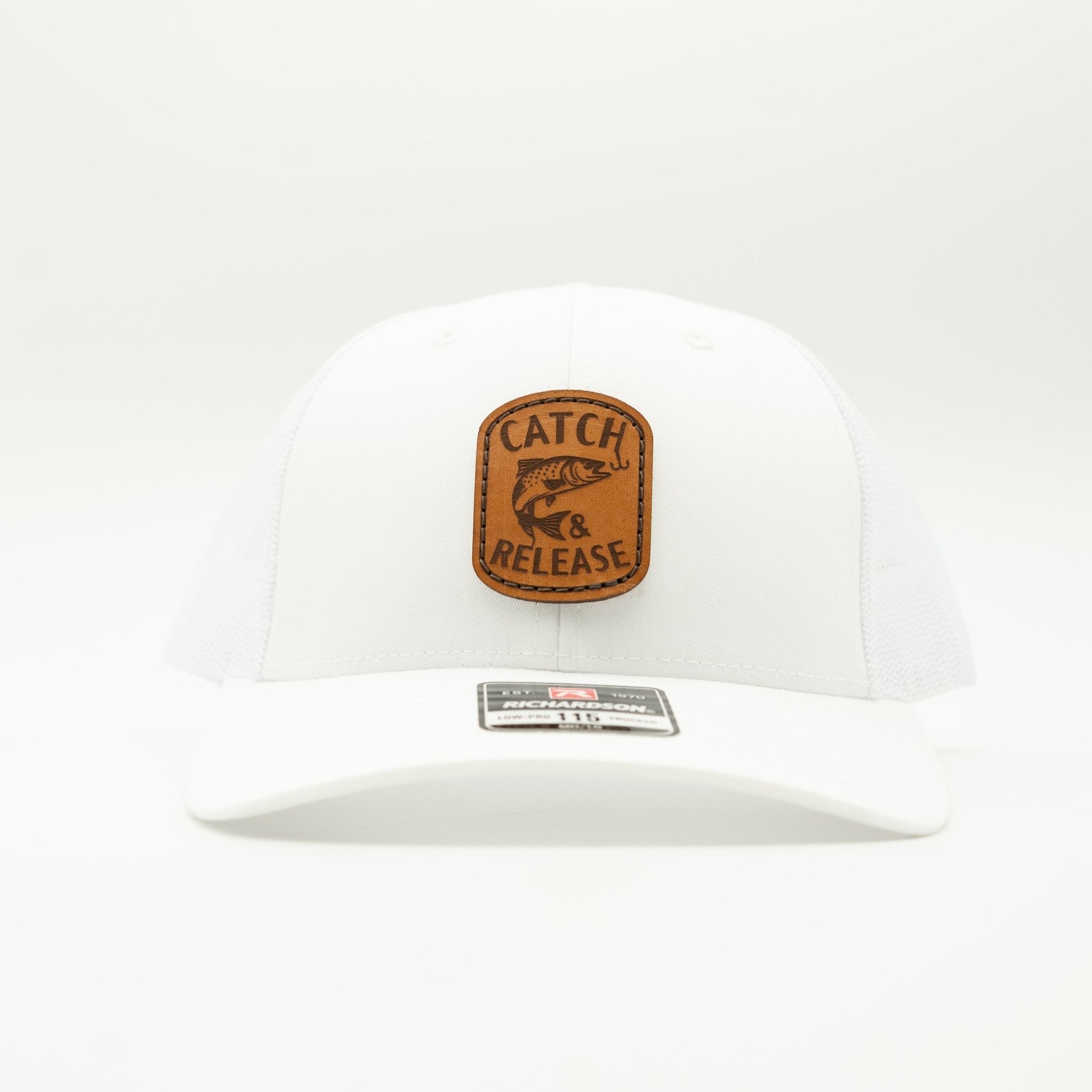 White cap with a brown patch on a white background
Color: Solid White