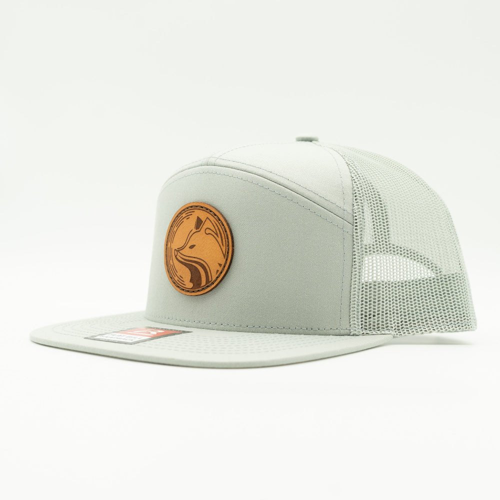 Side view of quarry Fox Hollow Richardson 168 hat, showing circular fox leather patch, straight brim, and breathable mesh.
Color: Quarry 168 (OSFM)