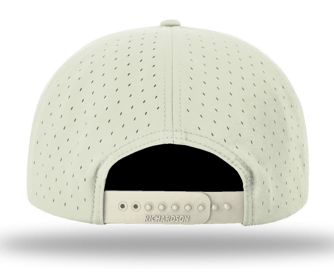 The back view of a light sage green perforated baseball cap with an adjustable strap and 'RICHARDSON' branding on the metal slider.
Color: Ivory