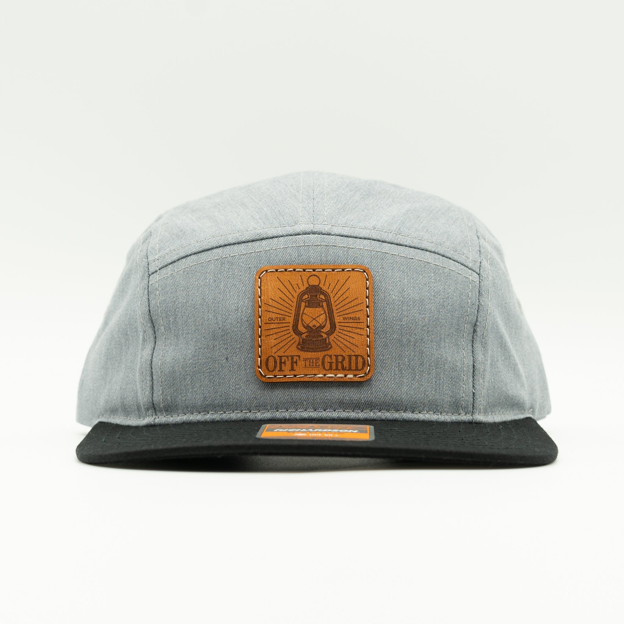 Heather grey black Off The Grid leather patch camper hat front view, contrast bill Richardson 217 for modern adventure style.