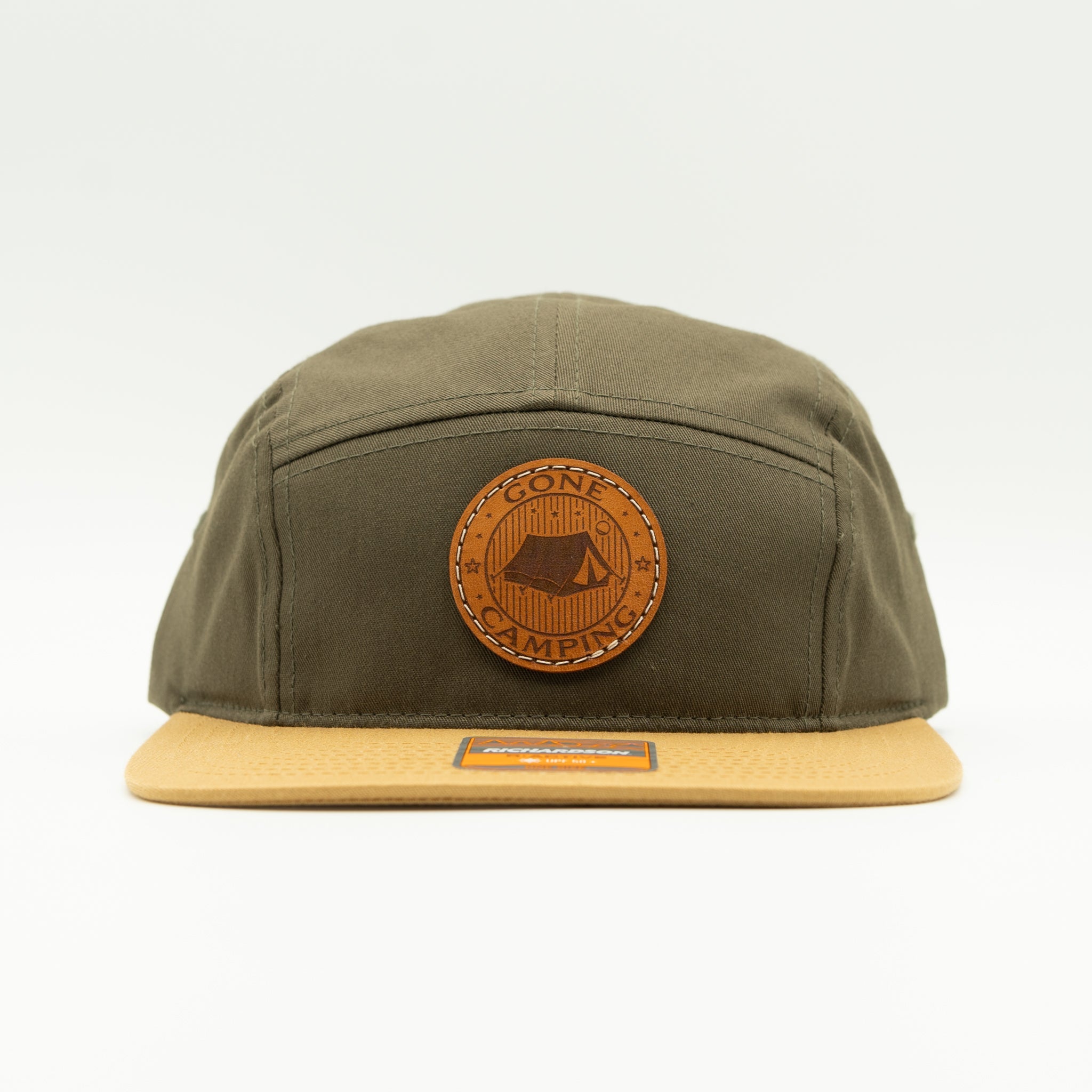 Front view of loden/biscuit Richardson 217 camper hat with round Gone Camping leather patch.
Color: Loden/Biscuit