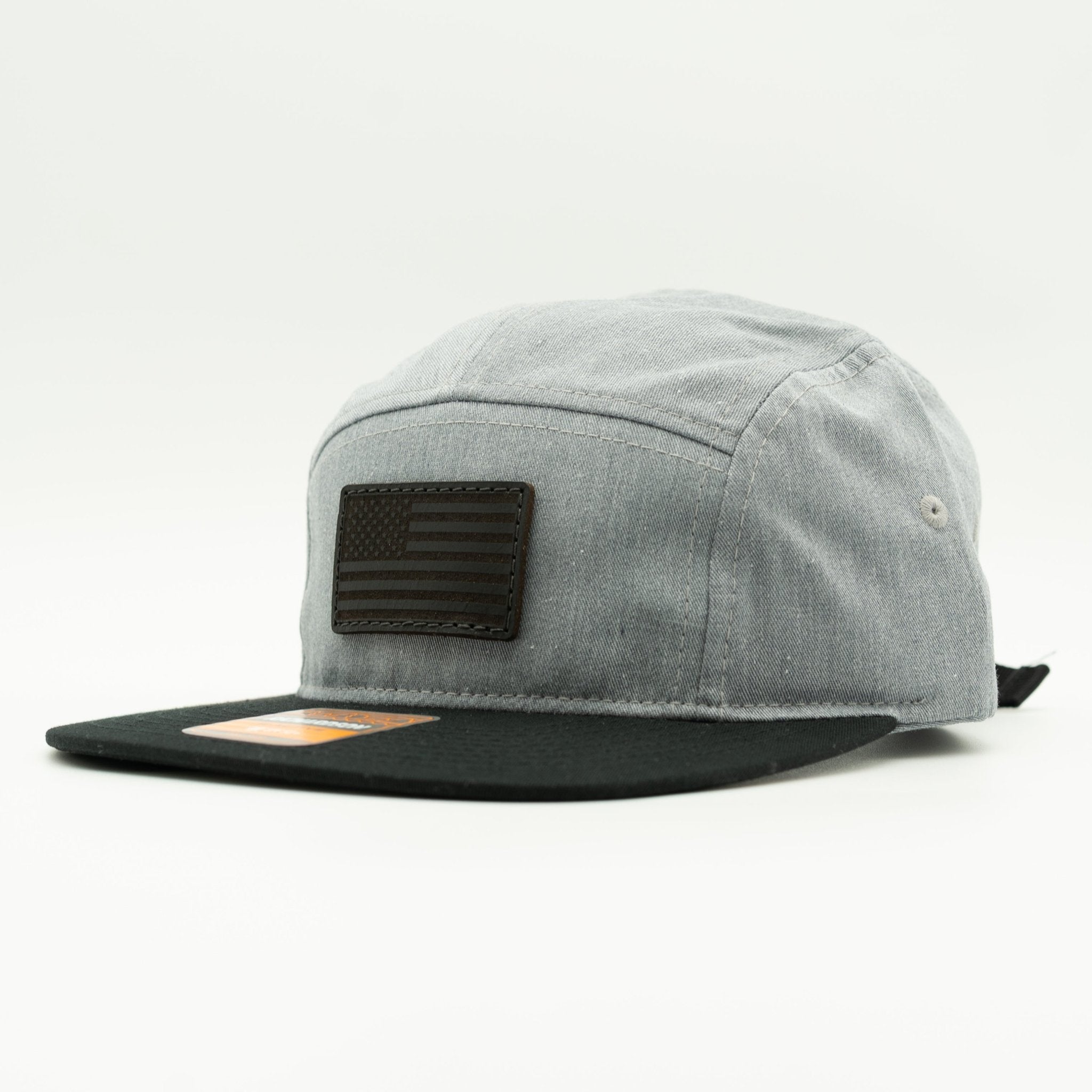 Gray cap with black flag patch on a white background
Color: Heather Grey/Black