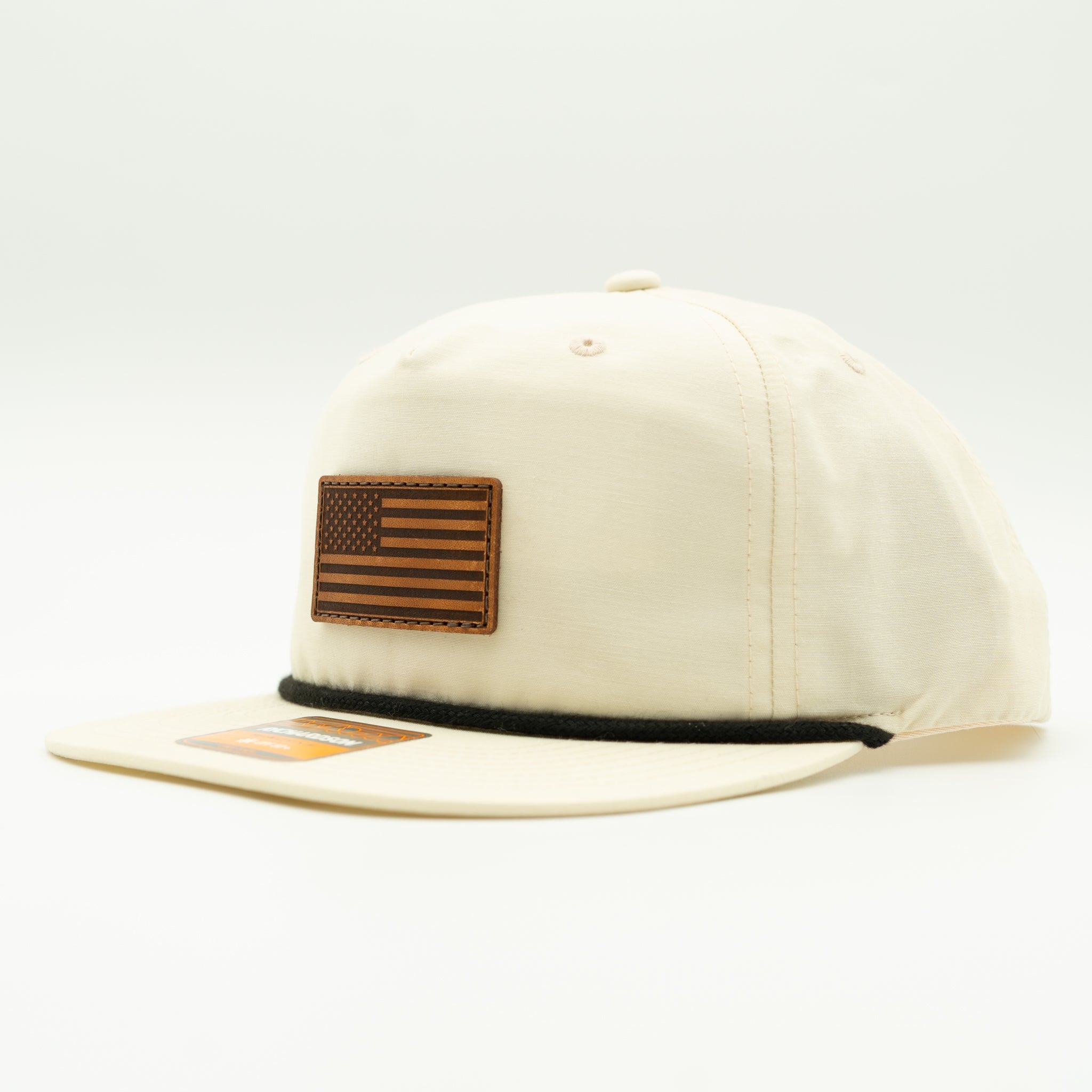 Side view of birch Richardson 256 American flag rope hat with light brown leather patch and flat bill.
Color: Birch