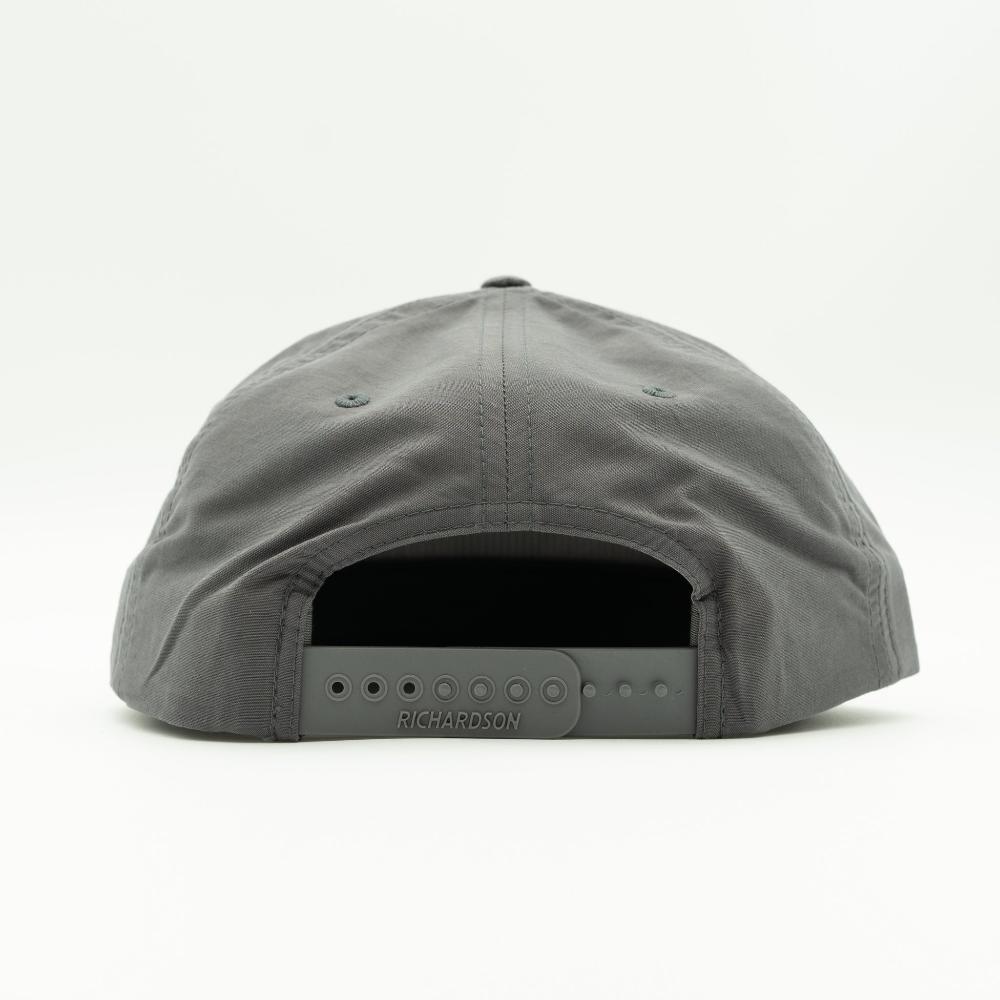 Back of charcoal Richardson 256 American flag rope hat, showing snapback closure and UPF 50+ tag.
Color: Charcoal/White