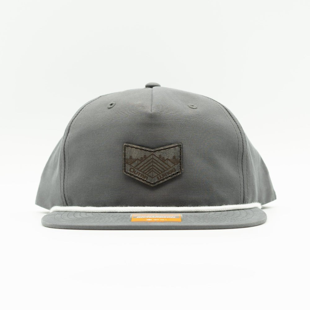 Charcoal Richardson 256 rope hat snapback, flat bill with rope accent, sewn real leather Midnight Mountain patch, low profile fit.