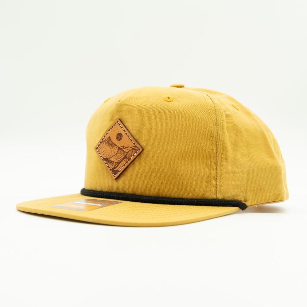 Front of biscuit Richardson 256 Desert Mountain rope hat showing leather mountain patch, flat bill, and rope accent.
Color: Biscuit