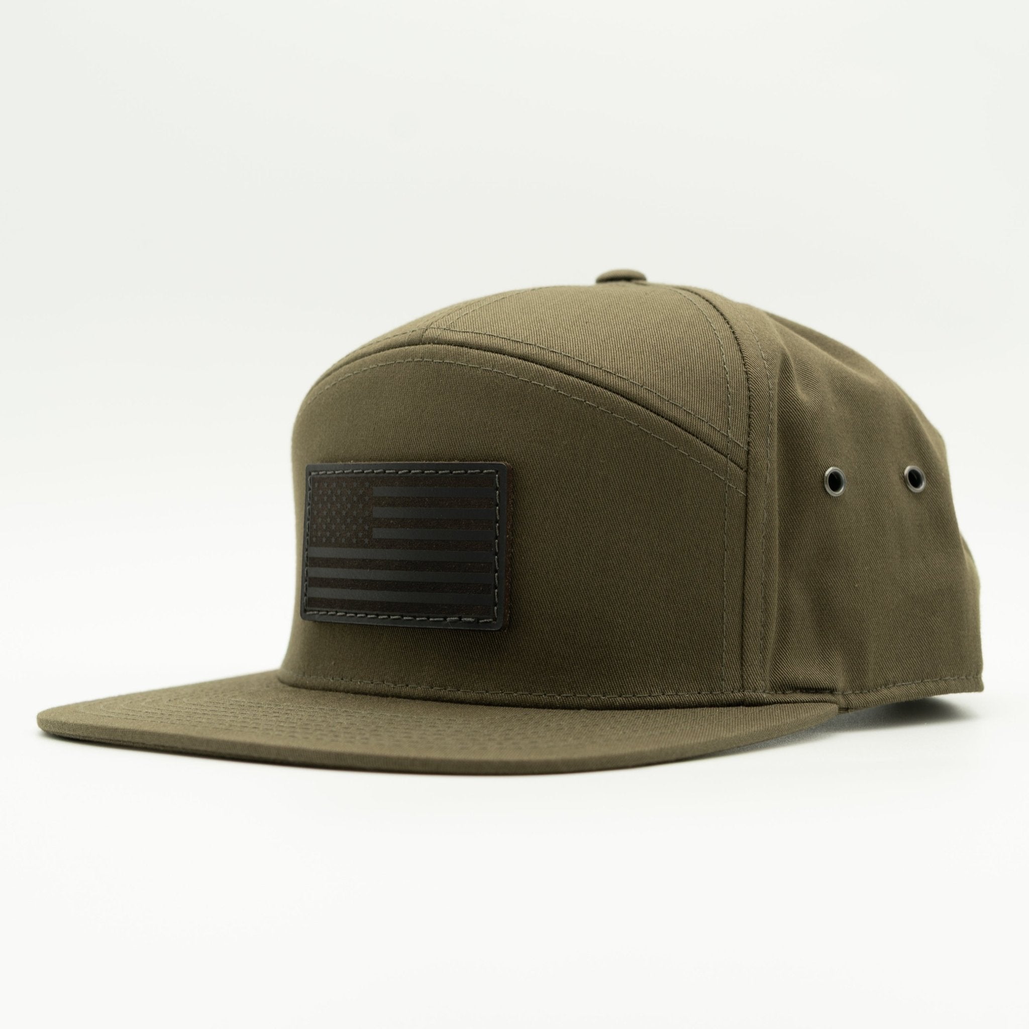 Olive green cap with a black patch on a white background
Color: Olive