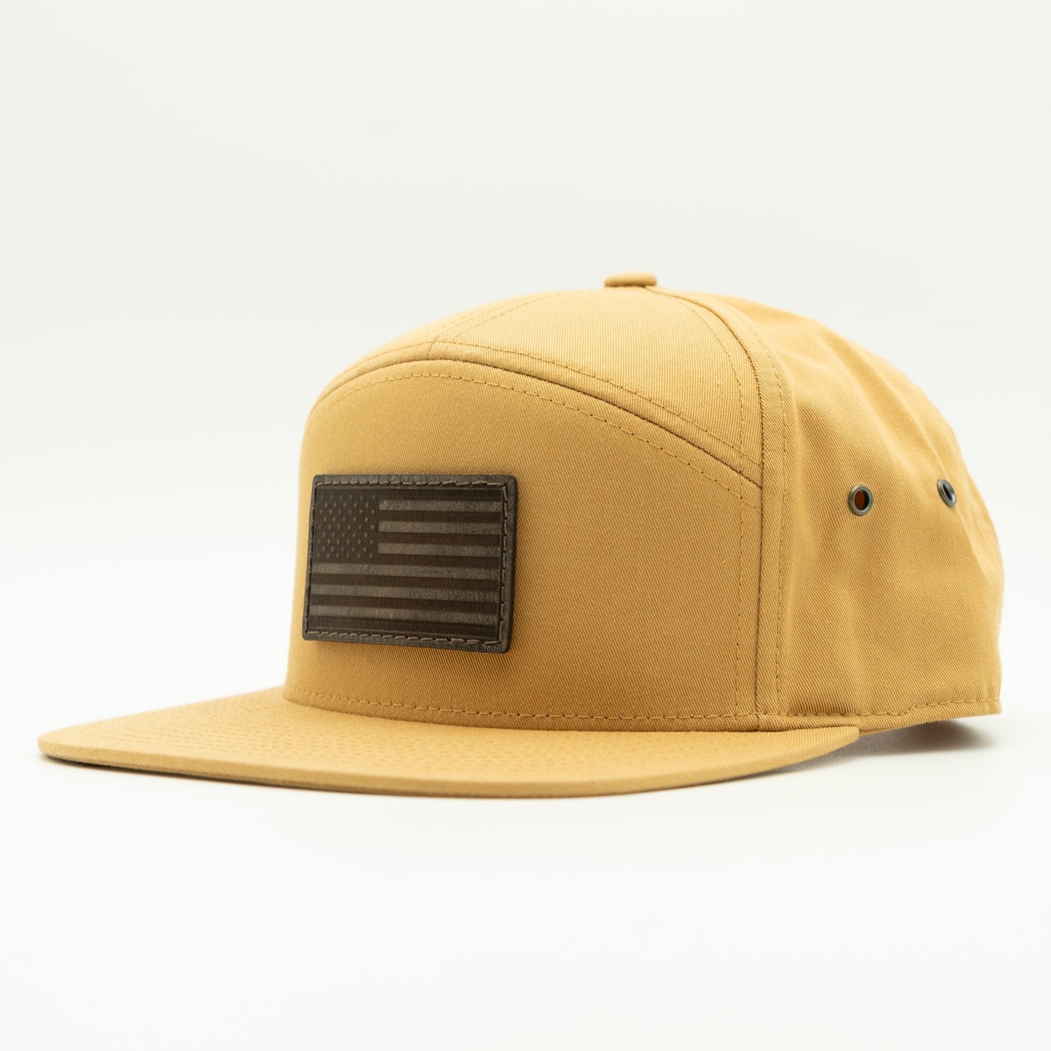 Yellow cap with an American flag patch on a white background
Color: Biscuit