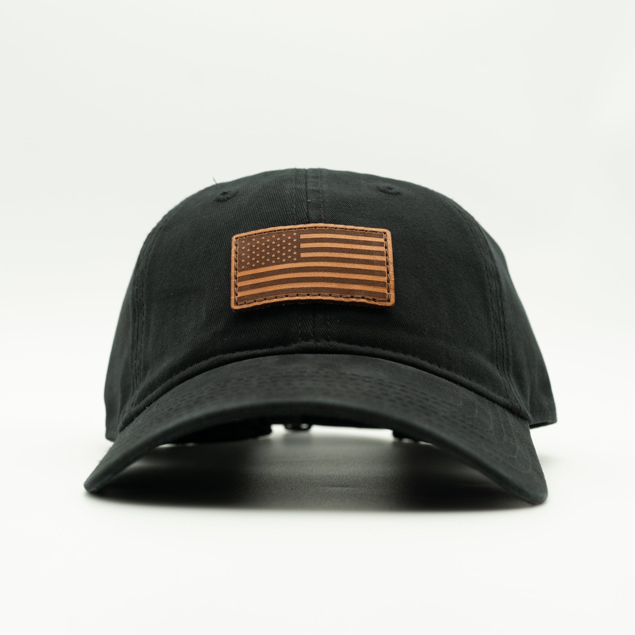 Black cap with an American flag patch on a white background
Color: Black