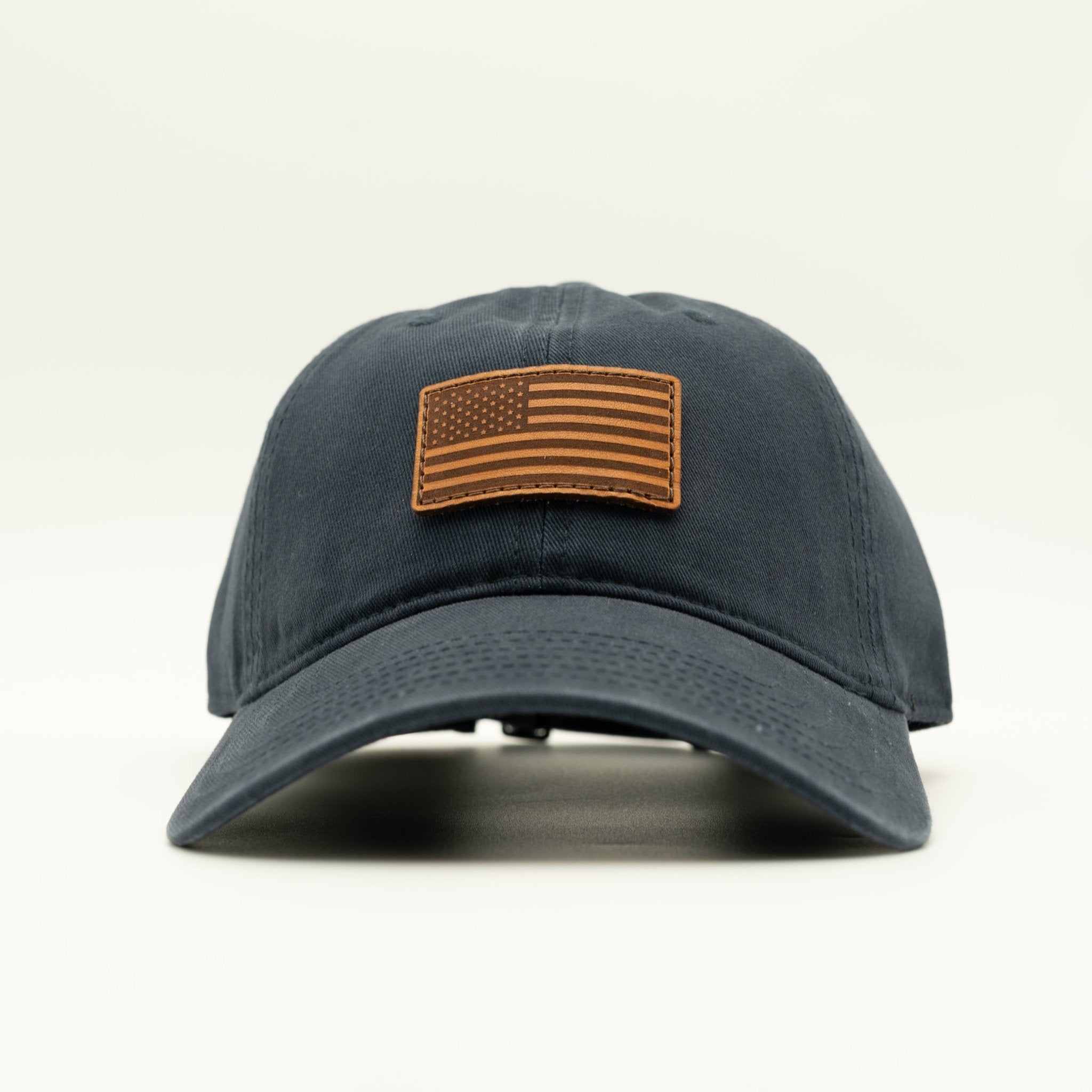 Dark blue cap with an American flag patch on a light gray background
Color: Navy