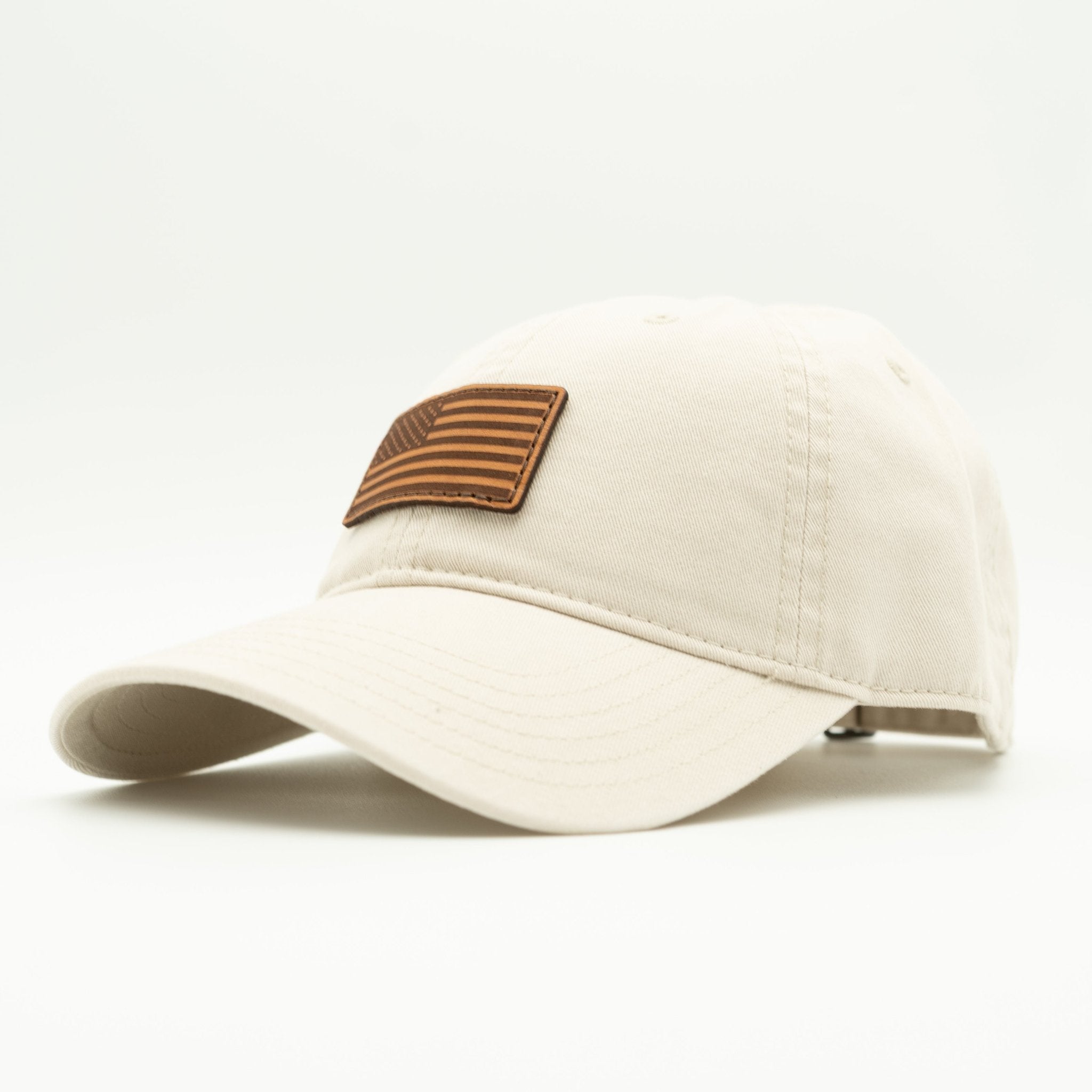 Beige cap with a brown leather patch on a white background
Color: Stone