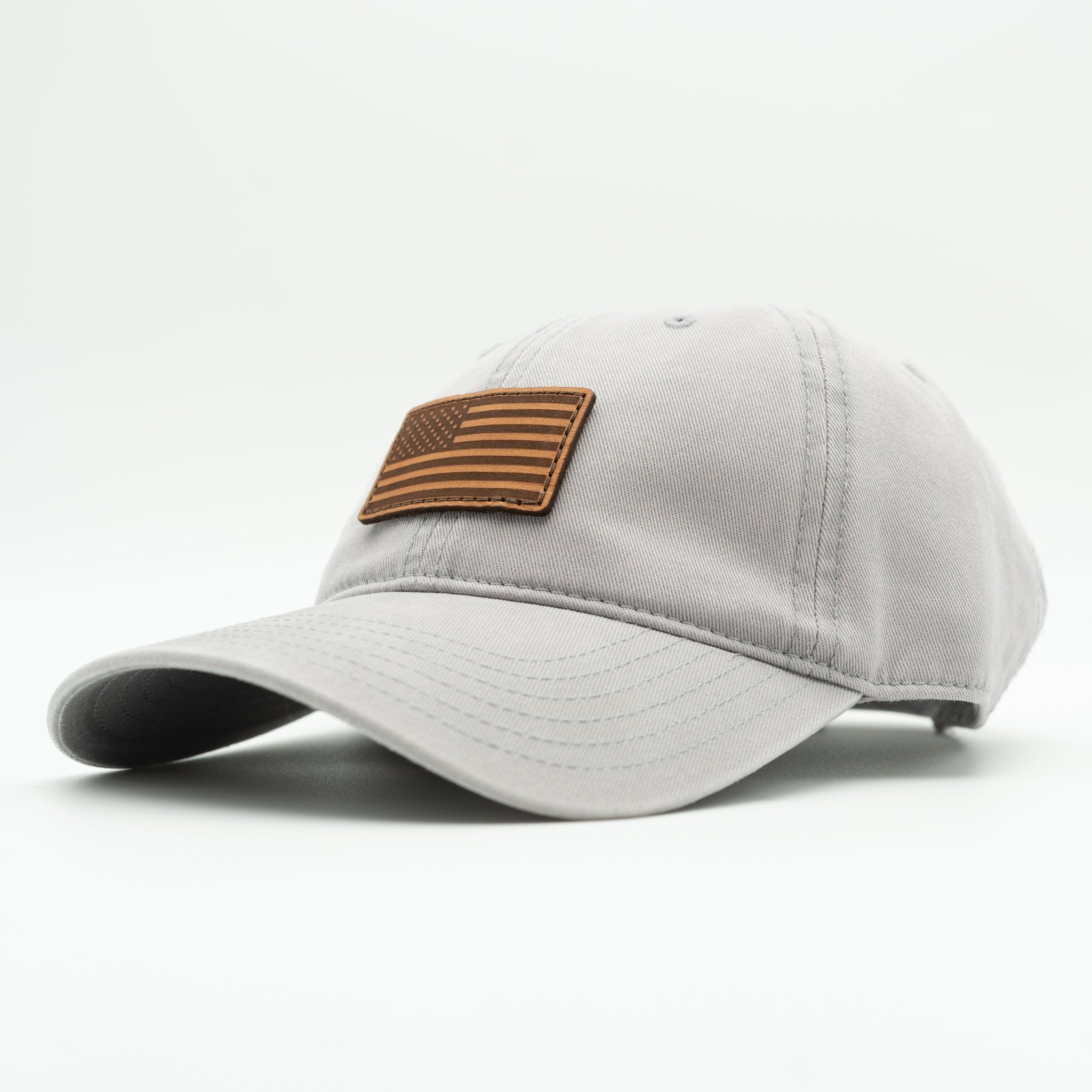 Gray cap with an American flag patch on a white background
Color: Grey