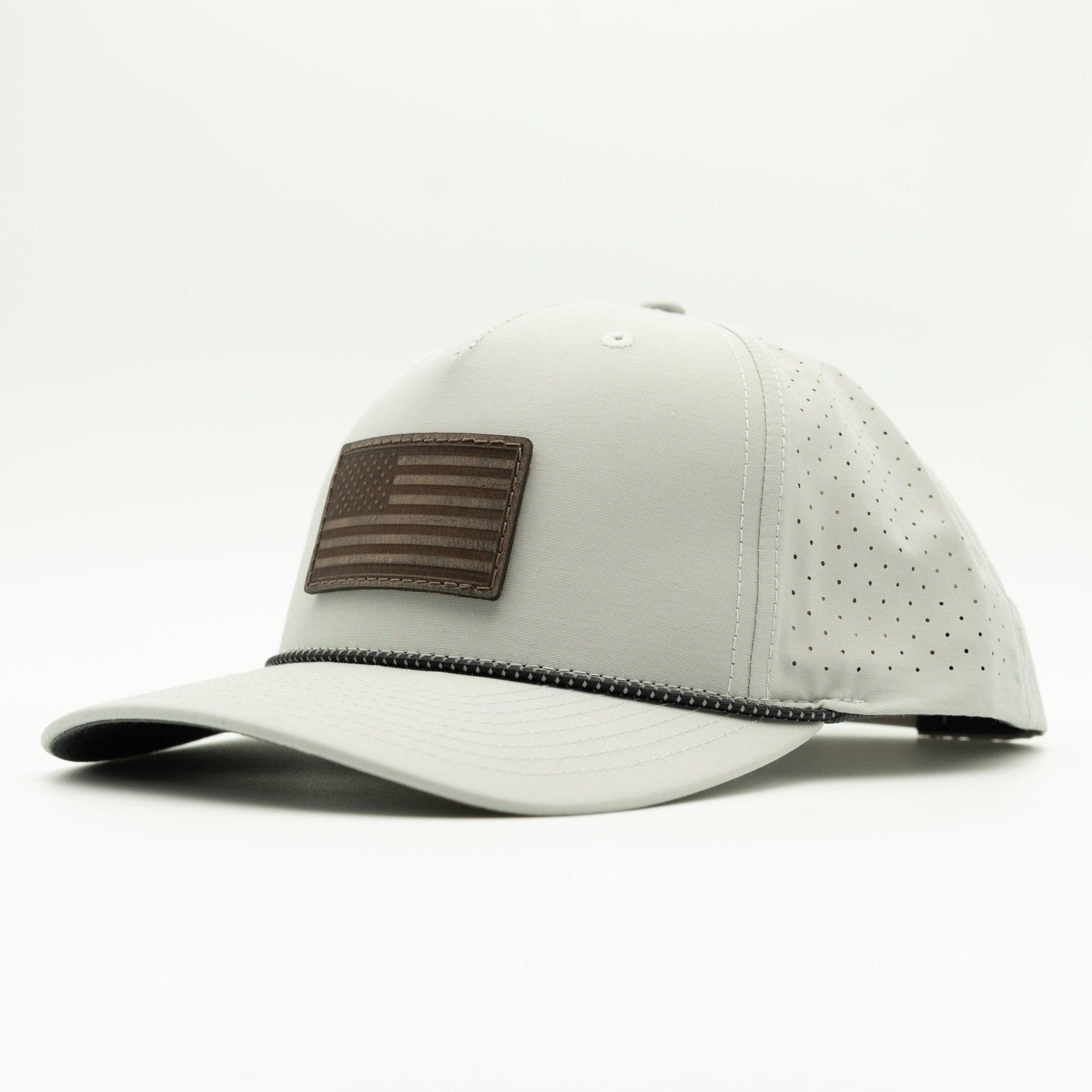 White baseball cap with brown flag patch on a white background
Color: Silver