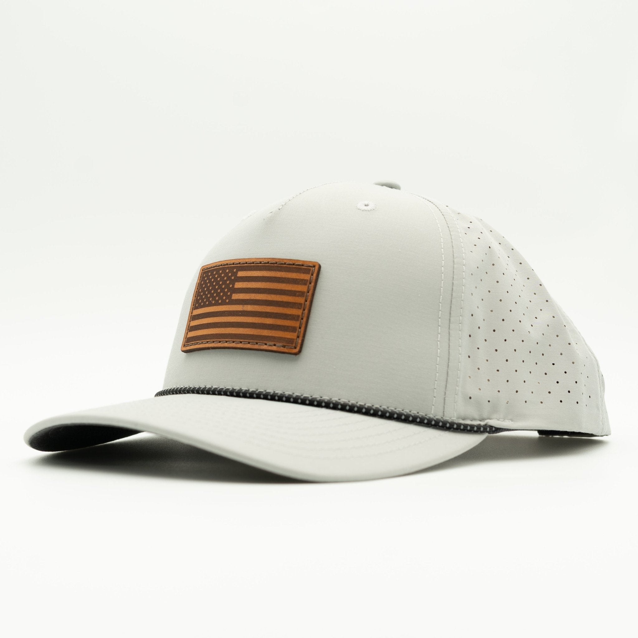 White baseball cap with brown American flag patch on a white background
Color: Silver