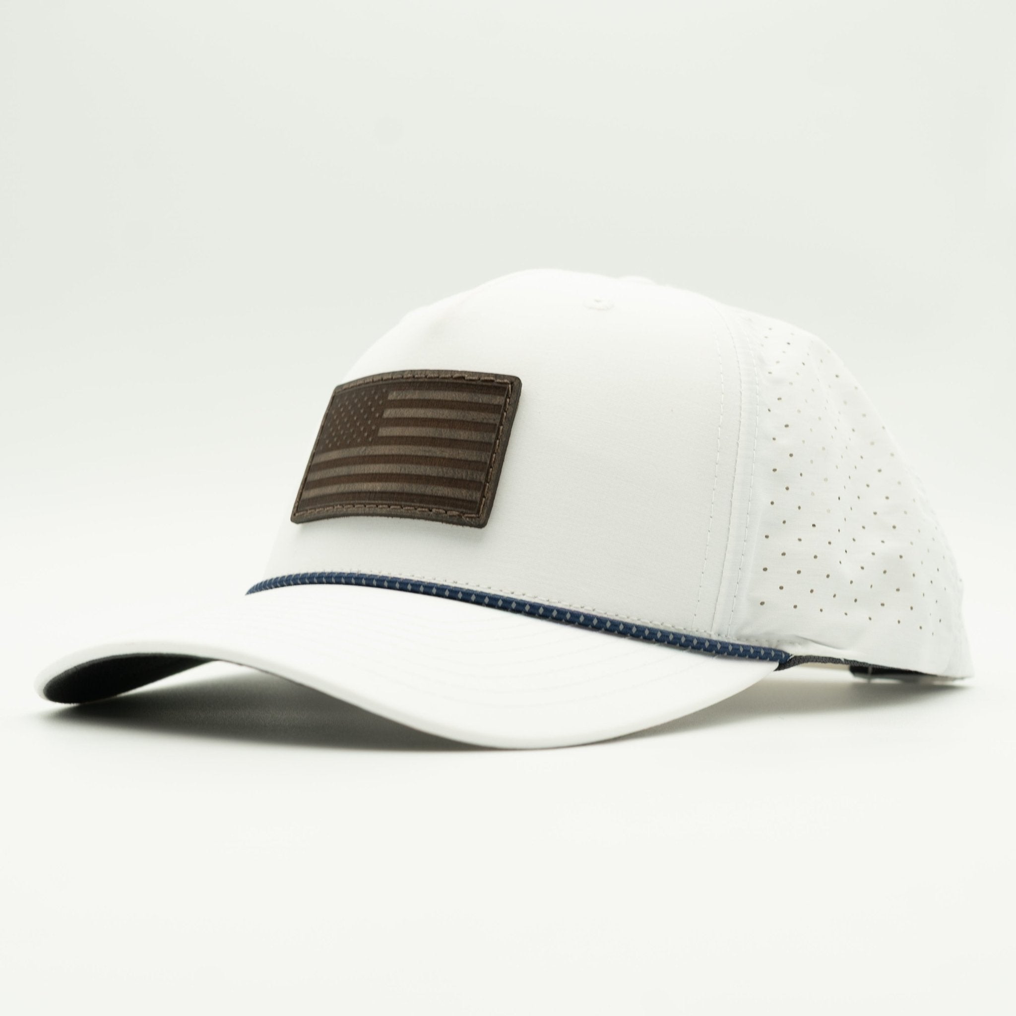 White cap with brown flag patch on a light gray background
Color: White/Navy