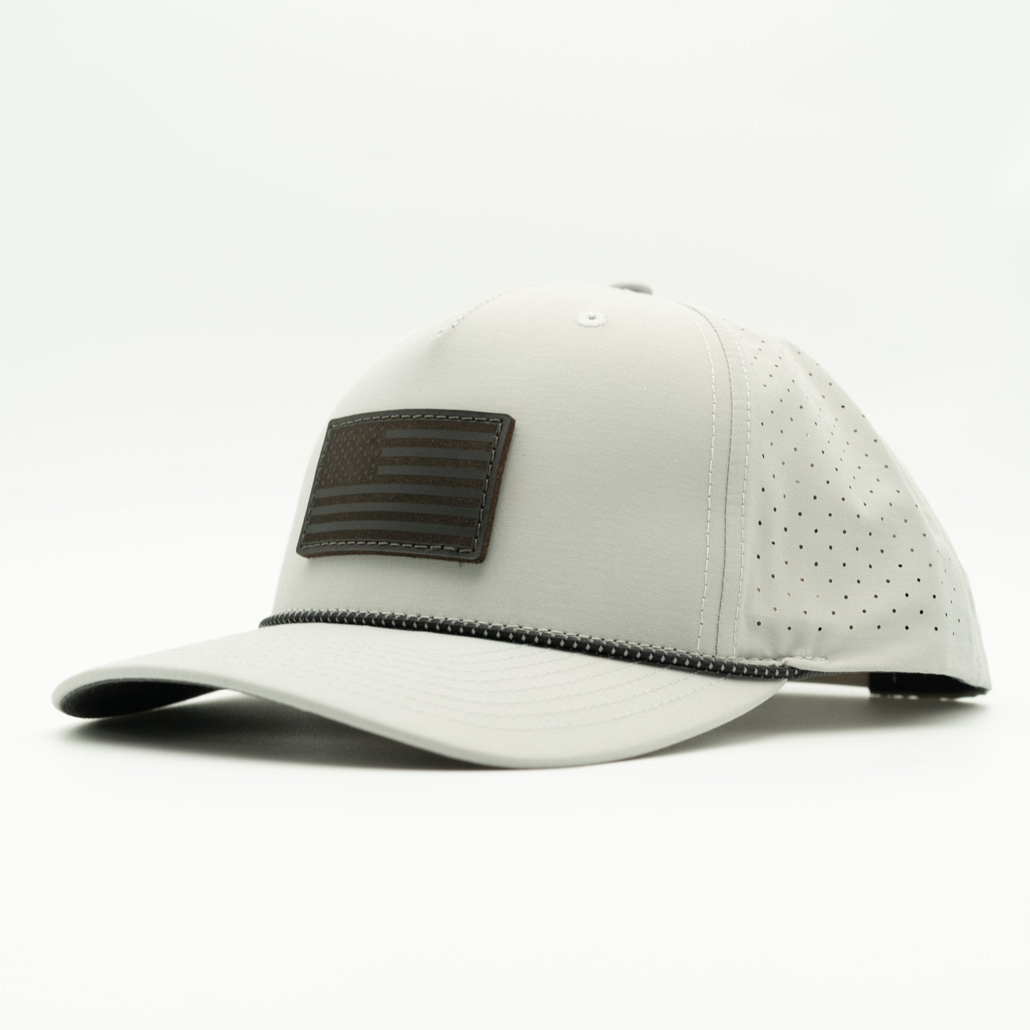 White baseball cap with a black patch on a white background
Color: Silver