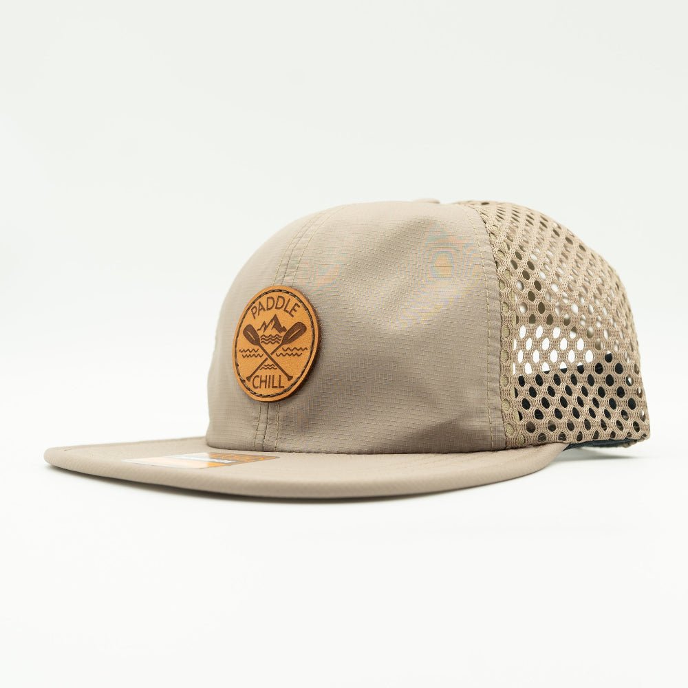Side view of khaki Paddle and Chill leather patch hat on Richardson 935, low profile water resistant paddleboarding hat with mesh back and strap.