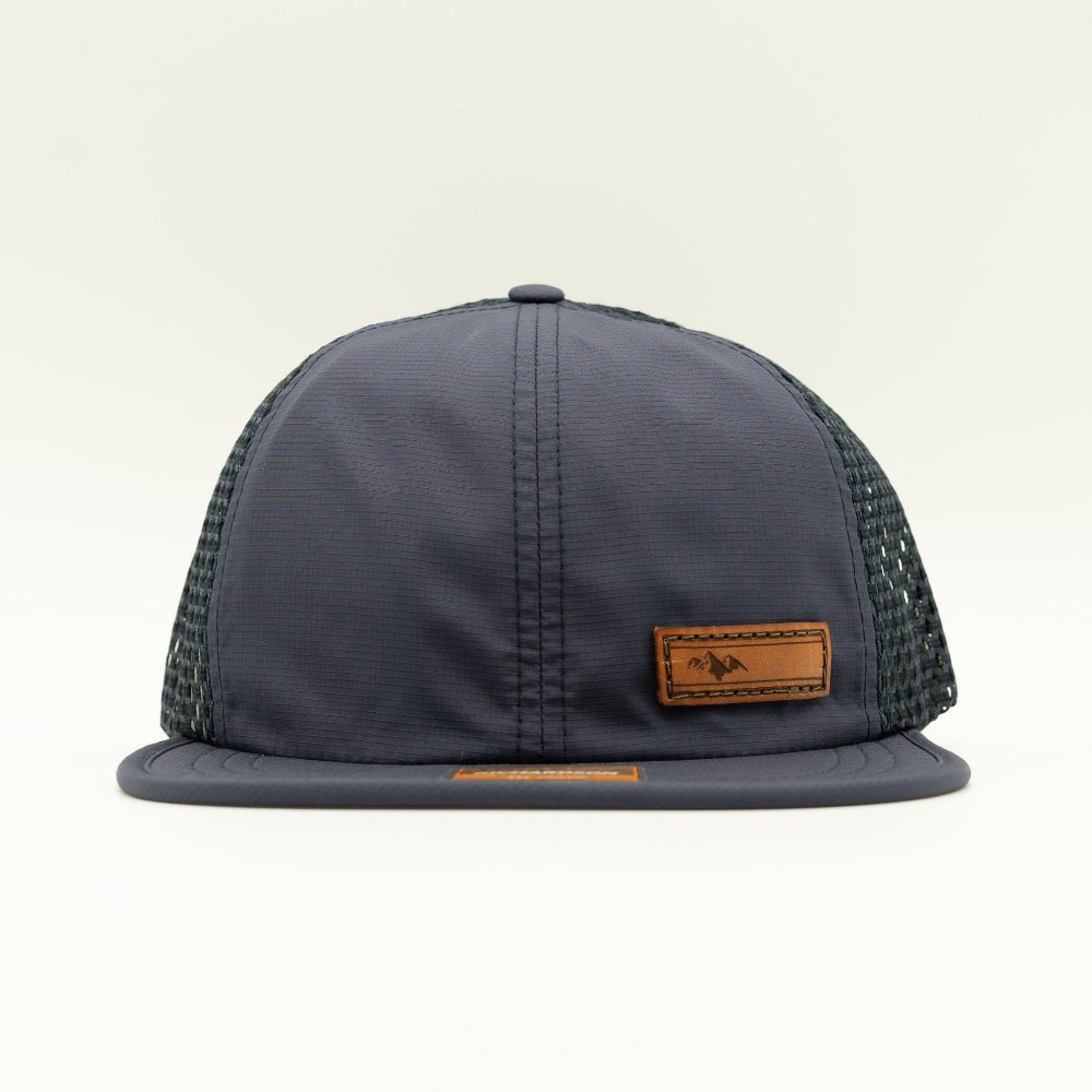 Navy Richardson 935 performance hat front view featuring engraved leather Active Mountain patch, water resistant performance hat for hiking and travel
Color: Navy/Navy