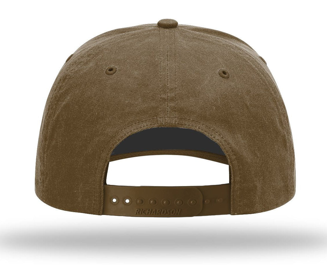 The back view of a brown cotton twill snapback cap with an adjustable strap and 'SNAPBACK' text on the leather tab, shown on a white background with a soft shadow.
Color: Buck
