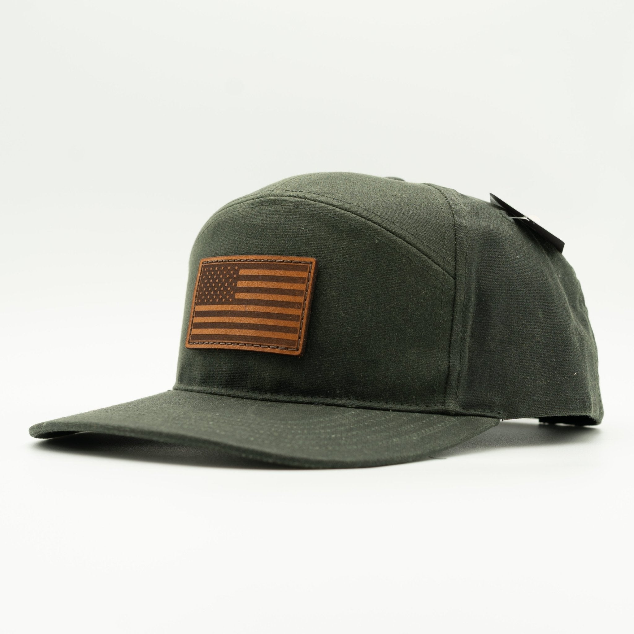 Green cap with an American flag patch on a white background
Color: Dark Olive