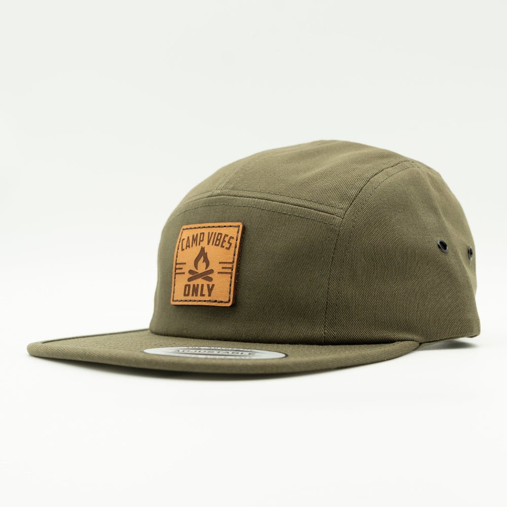 Side view of olive Camp Vibes Only leather patch hat on a Yupoong 7005 low profile 5 panel camper cap with flat bill.
Color: Olive