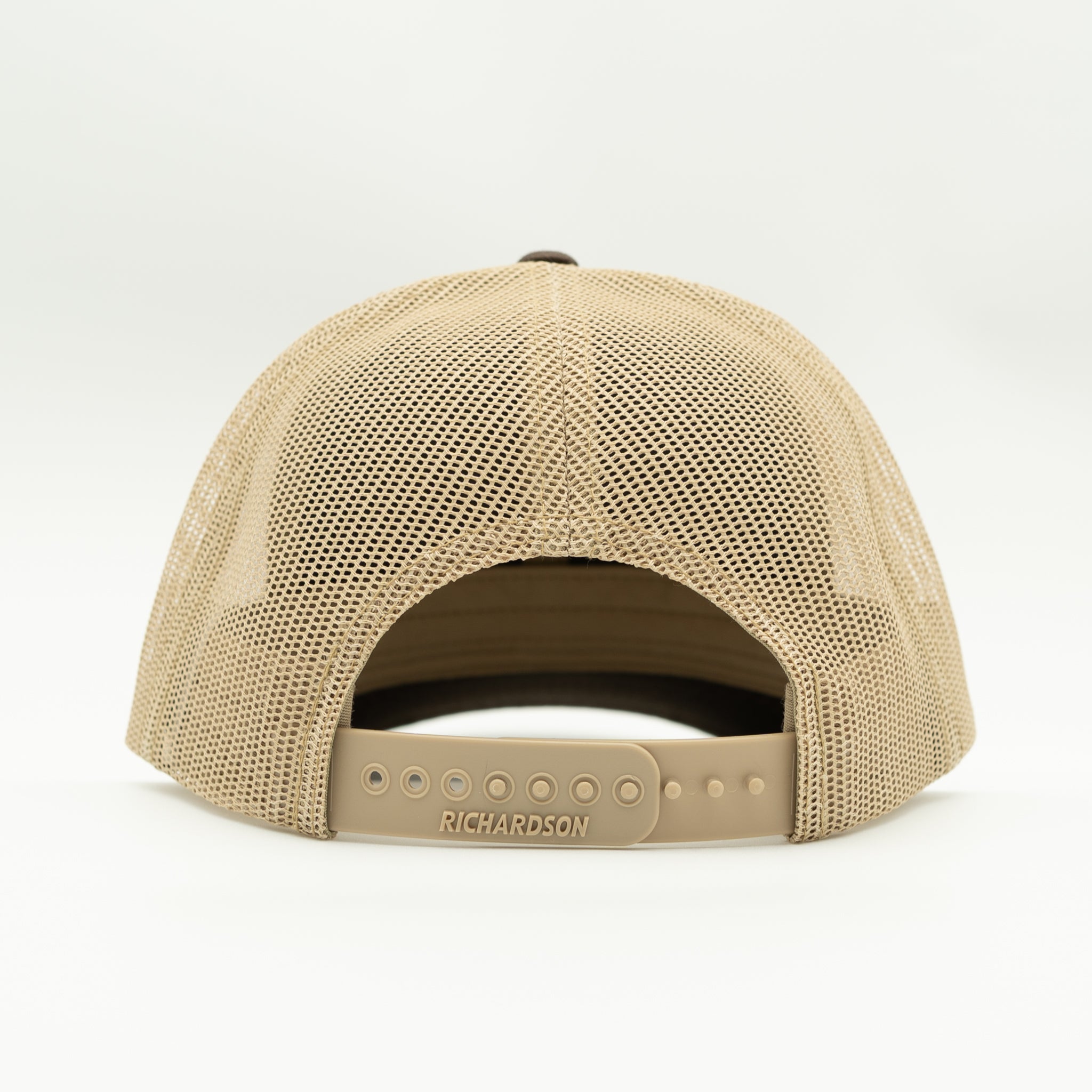Back view of Brown Khaki Blossom leather patch Richardson 115 showing brown mesh and adjustable snapback strap.

Color: Brown/Khaki
