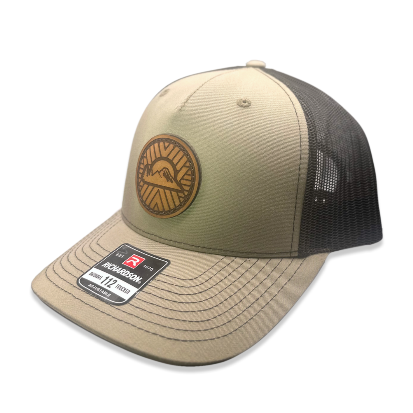 Custom Khaki/Coffee nRichardson Leather Patch hat. Our custom designed leather patch is laser engraved and sewn onto a Richardson 112 Hat. We use full-grain, veg tanned leather. Our custom leather patches are handmade and designed in Colorado, USA.