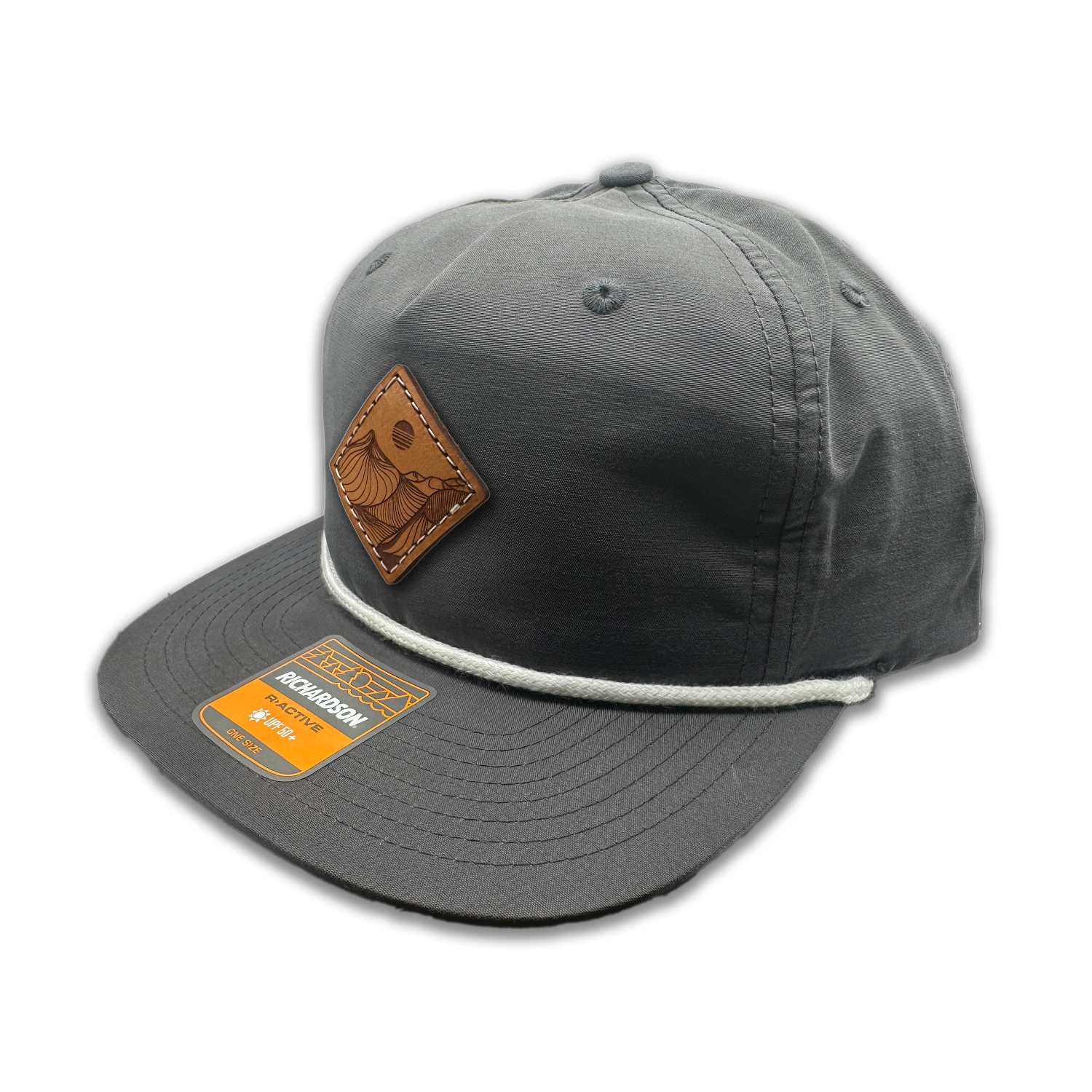 Get a taste of rugged charm with the Charcoal Richardson 256 Rope Umpqua Hat. Made in Colorado, USA, this low profile SnapBack cap features a stylish Desert Mountain patch design. The genuine leather patch, laser engraved and sewn on, adds a touch of sophistication to this flatbill hat crafted from lightweight material.