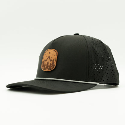 Side view of the Starry Night Leather Patch Hat by Outer Wings in Black, showcasing the rope detail, water-resistant fabric, and adjustable SnapBack. A sleek and stylish custom leather patch hat for casual wear.