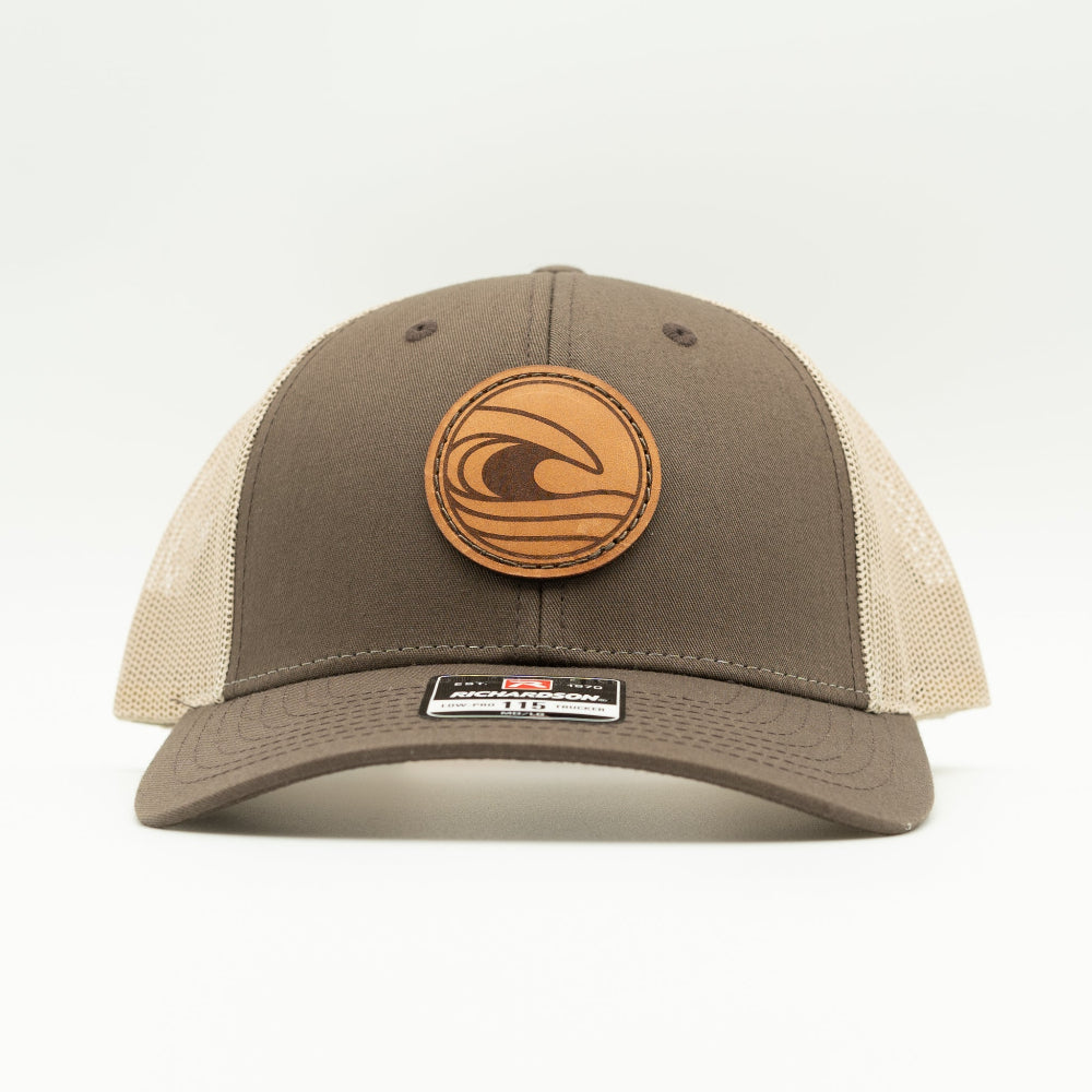 Front view of the Tidal Wave Leather Patch Hat by Outer Wings in Brown/Khaki, highlighting the breathable mesh back, adjustable SnapBack, and structured profile. A stylish custom leather patch hat for outdoor and casual wear.