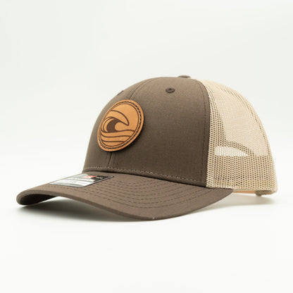 Side view of the Tidal Wave Leather Patch Hat by Outer Wings in Brown/Khaki, highlighting the breathable mesh back, adjustable SnapBack, and structured profile. A stylish custom leather patch hat for outdoor and casual wear.