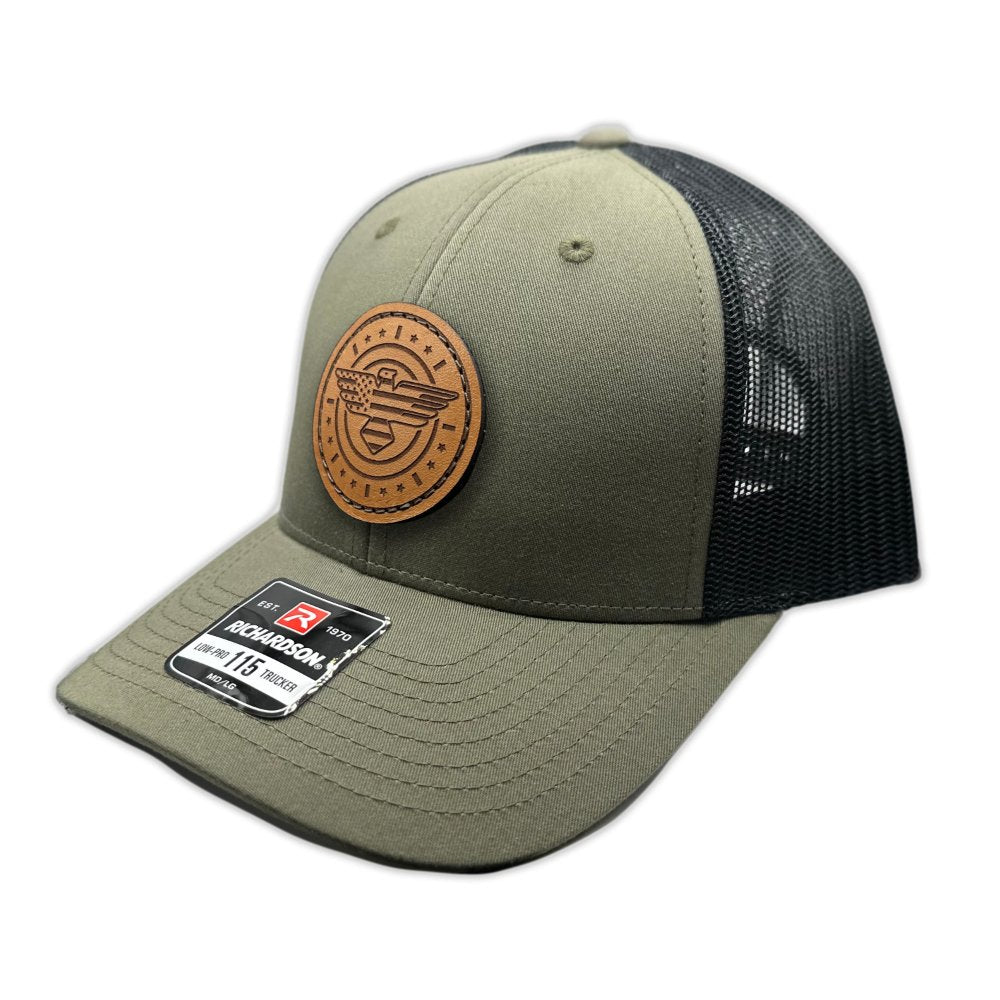 Side view of the American Eagle Design leather patch hat by Outer Wings in loden/black, highlighting the low-profile structure and classic SnapBack closure. The hat's eagle-themed leather patch is expertly sewn on, combining a patriotic motif with outdoor style.