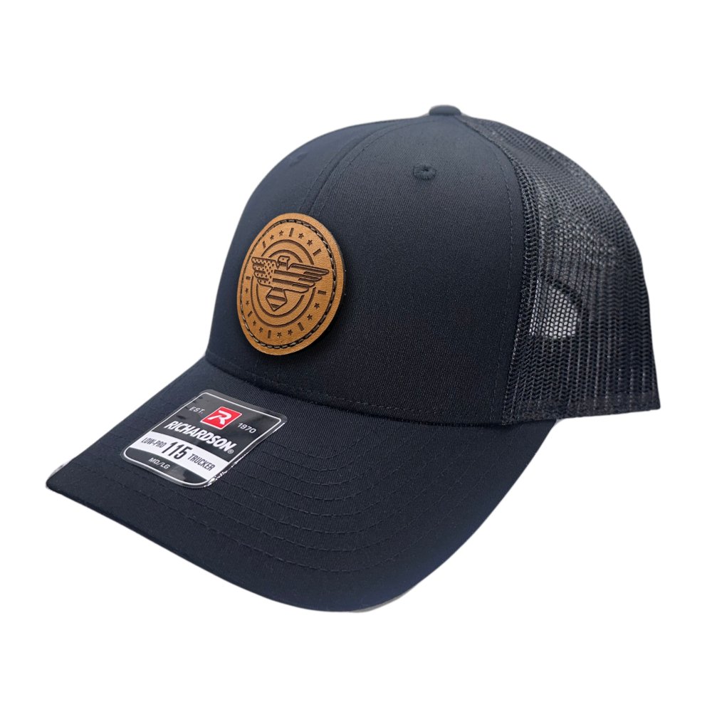 Side view of the American Eagle Design leather patch hat by Outer Wings in black/black, highlighting the low-profile fit and classic SnapBack closure. The hat's design features a detailed leather patch with an eagle, flag, stars, and stripes, making it a standout piece for any collection.