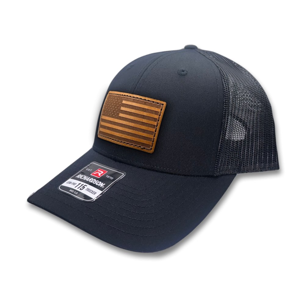 Side view of the Black American Flag Hat, showing the sleek black mesh back and snapback closure, with the American Flag leather patch visible from the side.