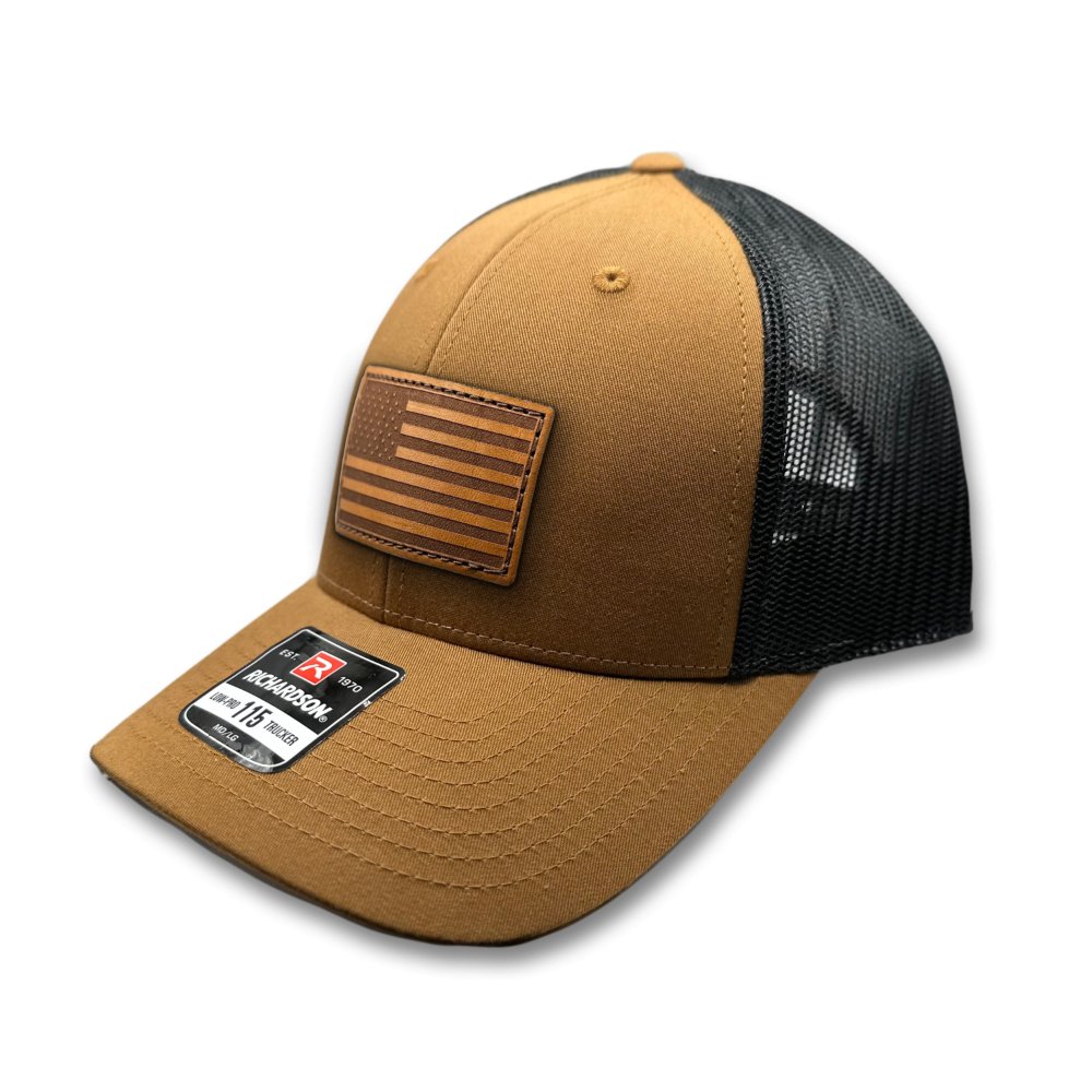 Side view of the Caramel/Black American Flag Hat, showcasing the black mesh back and snapback closure, with the American Flag leather patch visible from the side.