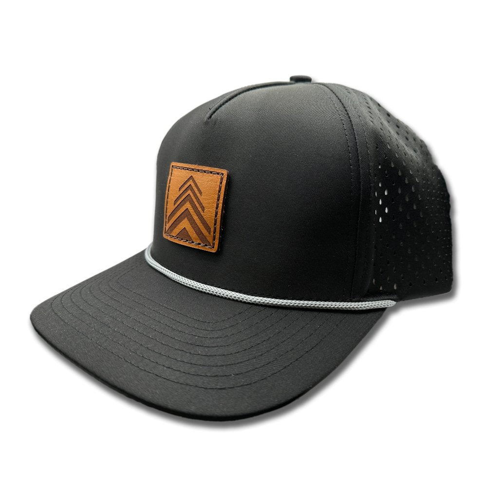 Side view of the Arrow Pine Hat by Outer Wings in black, showing the hat's structured high-profile silhouette, classic rope detail, and square patch with a triple arrow pine tree design. The water-resistant material and adjustable snapback ensure a comfortable fit for outdoor activities.