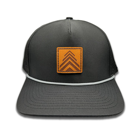 Front view of the Arrow Pine Hat by Outer Wings in black, crafted on a high-profile Outer Wings 970 hat with a square leather patch featuring a modern triple arrow design that doubles as a pine tree. This water-resistant hat combines style with functionality, offering a sleek and adventurous look.