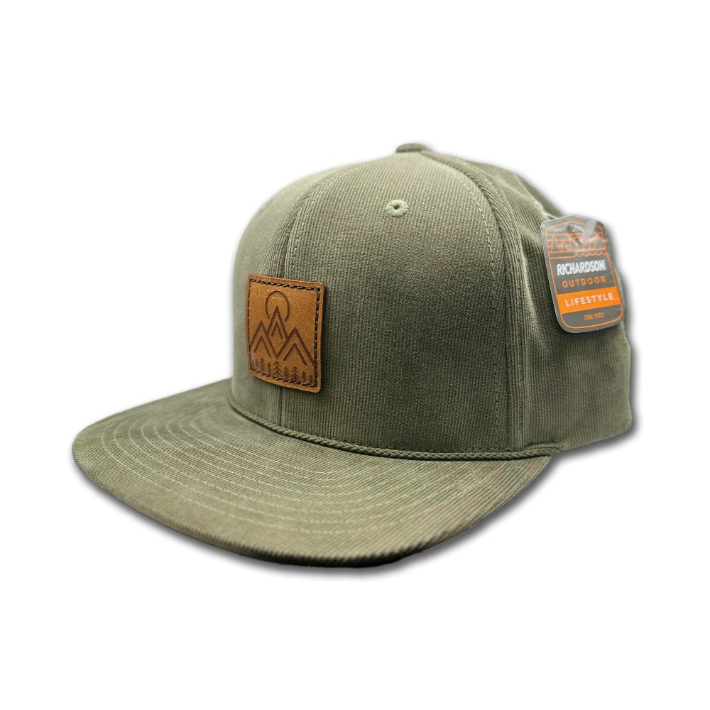 Side view of the Moonlite Mountain Hat in olive, highlighting the structured high-profile design, flat bill, and adjustable snapback closure. The hat showcases a genuine leather patch with a laser-engraved design of mountains, pine trees, and a moon, perfect for outdoor enthusiasts.