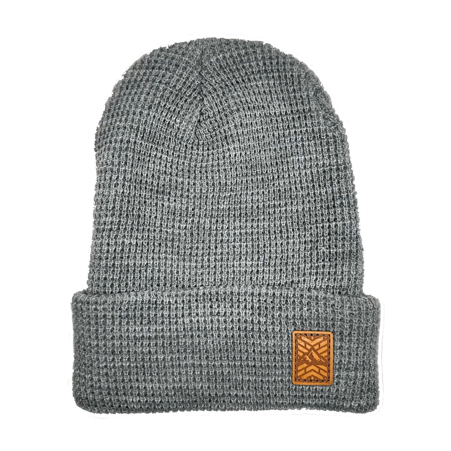 Richardson Stocking Cap with leather patch. Full grain, Veg tanned, real leather. This leather is laser engraved with a Mosaic Peak image. The Leather patch is sewn on to Beanie.