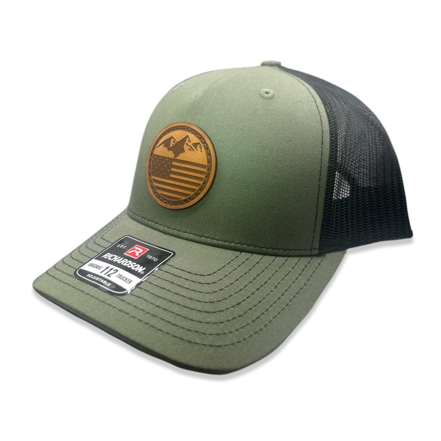 Side view of the Mountain Flag leather patch hat on Richardson 112FP in Loden/Black, highlighting the flat bill, adjustable snapback, and clean front panel. A rugged, stylish choice for outdoor enthusiasts