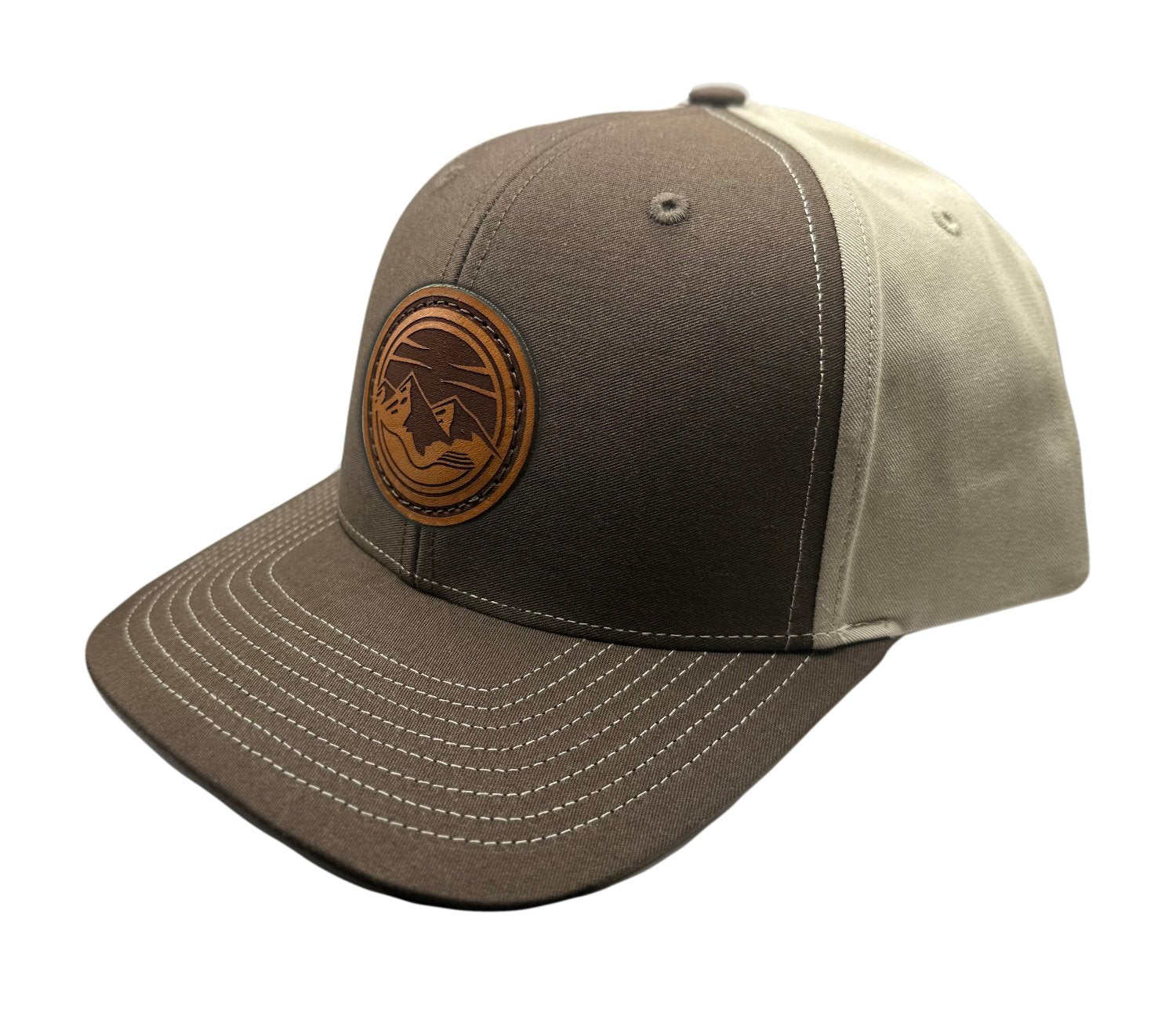 Side view of the Mountain Lake leather patch hat on Richardson 312 in Brown/Khaki, highlighting the pre-curved visor, adjustable snapback, and seamless front panel. A rugged, stylish choice for outdoor adventures.